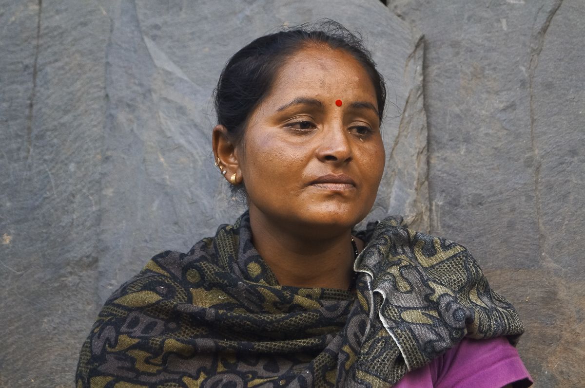 Krishna Kumari B.K., Giri Prasad B.K.'s wife, says she struggles to make a living in rural Nepal. Her 9-year-old daughter lives with her, but her 15-year-old son lives with relatives in Kathmandu, Nepal's capital city. Giri Prasad B.K. hasn't been home to Baglung district, which includes lush, green river valleys, since he left Qatar for the second time in 2007. Giri Prasad B.K.'s wife and 9-year-old daughter live in their home in rural Baglung district, located west of Kathmandu. Image by Yam Kumari Kandel