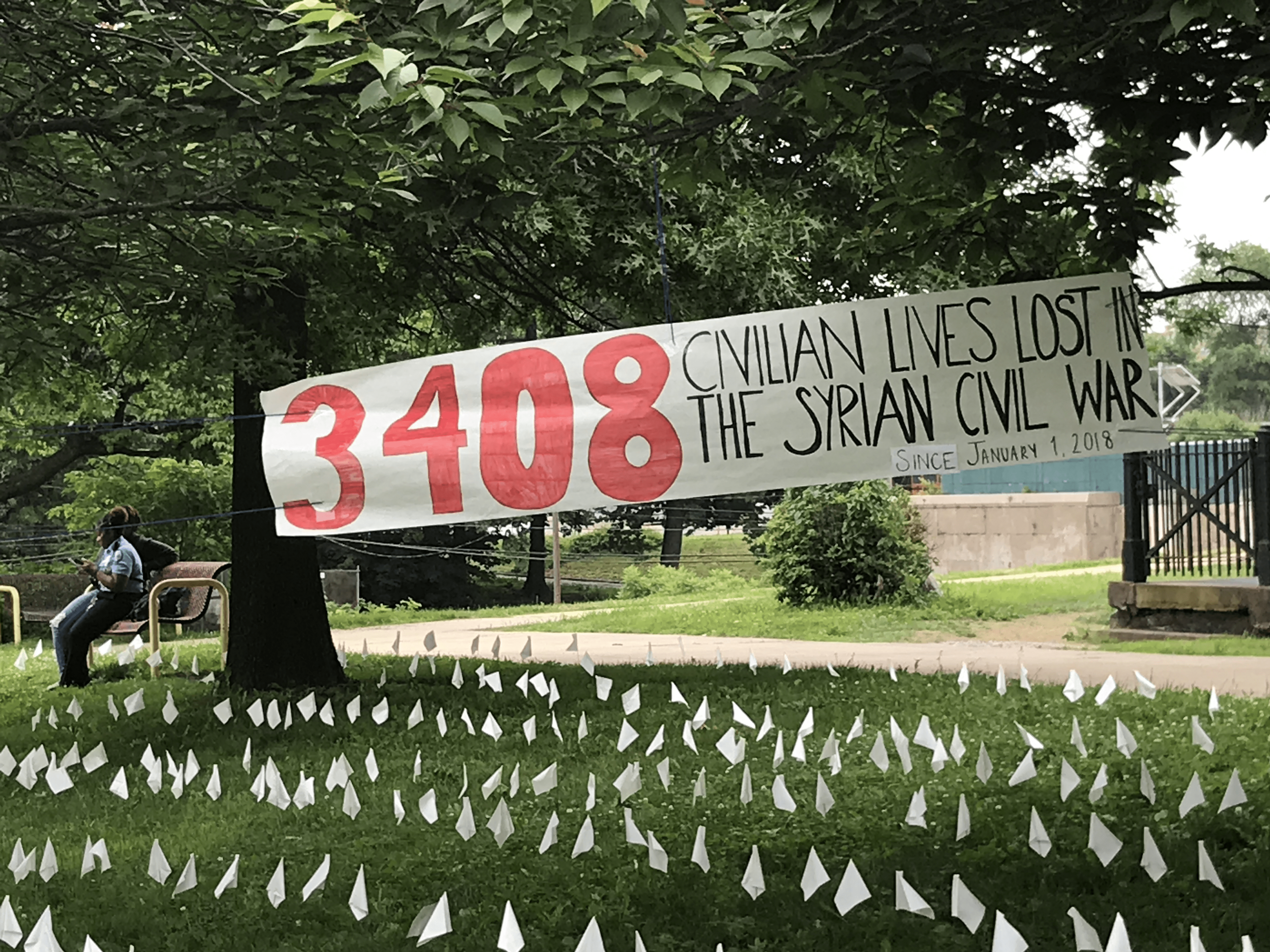 The visual installation of white flags was one of many projects Central High School students worked on to educate their community on the Arab Spring. Image by Ken Hung. Pennsylvania, 2018. 