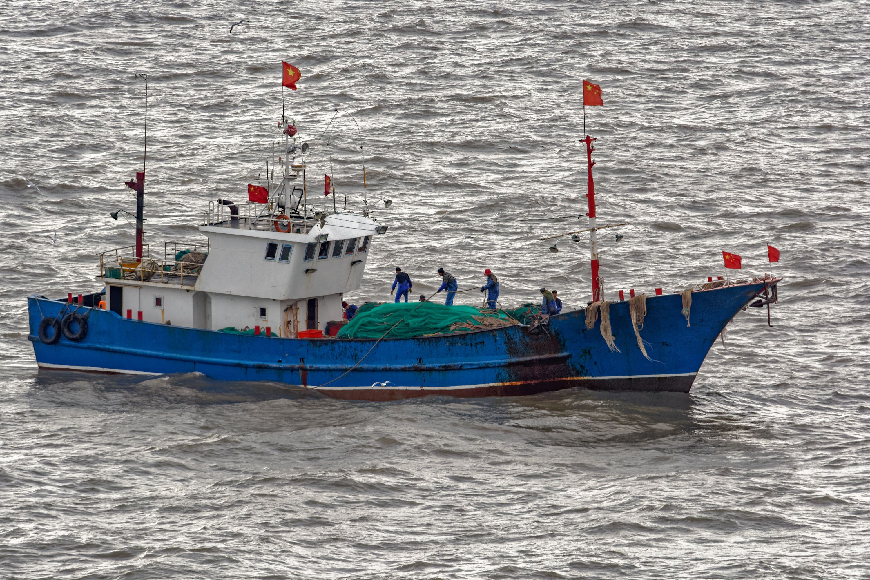 A commercial fishing boat on the South China Sea. Image by Igor Grochev / Shutterstock. 