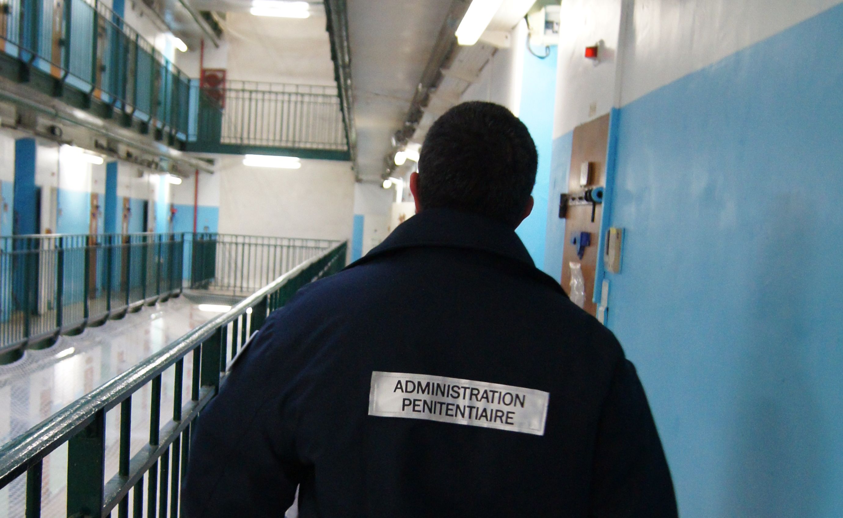 A warder patrolling a cell block at Fresnes, one of France’s biggest jails, during a visit I made earlier this month. Image by Christopher de Bellaigue. France, 2016.