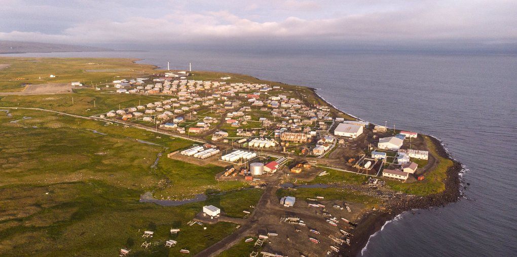 The village of Savoonga, with a population of about 700, spreads along the shores of St. Lawrence Island in the northern Bering Sea, giving residents a ringside seat to the effects of climate change. Most residents are Siberian Yup’ik, a Native people who also live along the northeast Russia coast. Image by Steve Ringman. United States, 2019.