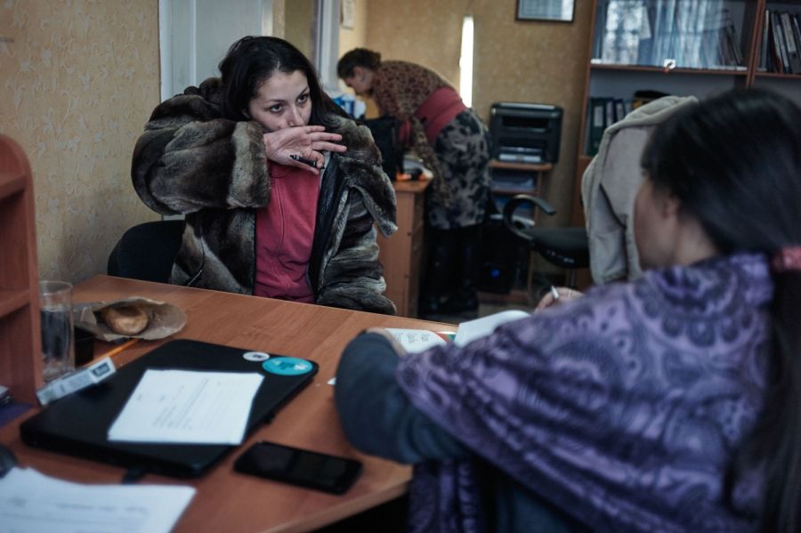 Irina, 28, (left) fled the war from Enakievo, a town now under separatist control in eastern Ukraine. She is an intravenous drug user and receives substitution therapy which was made illegal by separatists. NGO Svitanok Club assists her in her hometown Kramatorsk.