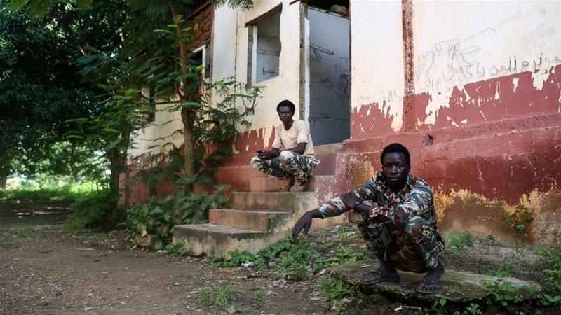 The FPRC in Ndele, Central African Republic, uses two crumbling buildings as the base for their soldiers. Image by Cassandra Vinograd. Central African Republic, 2017.