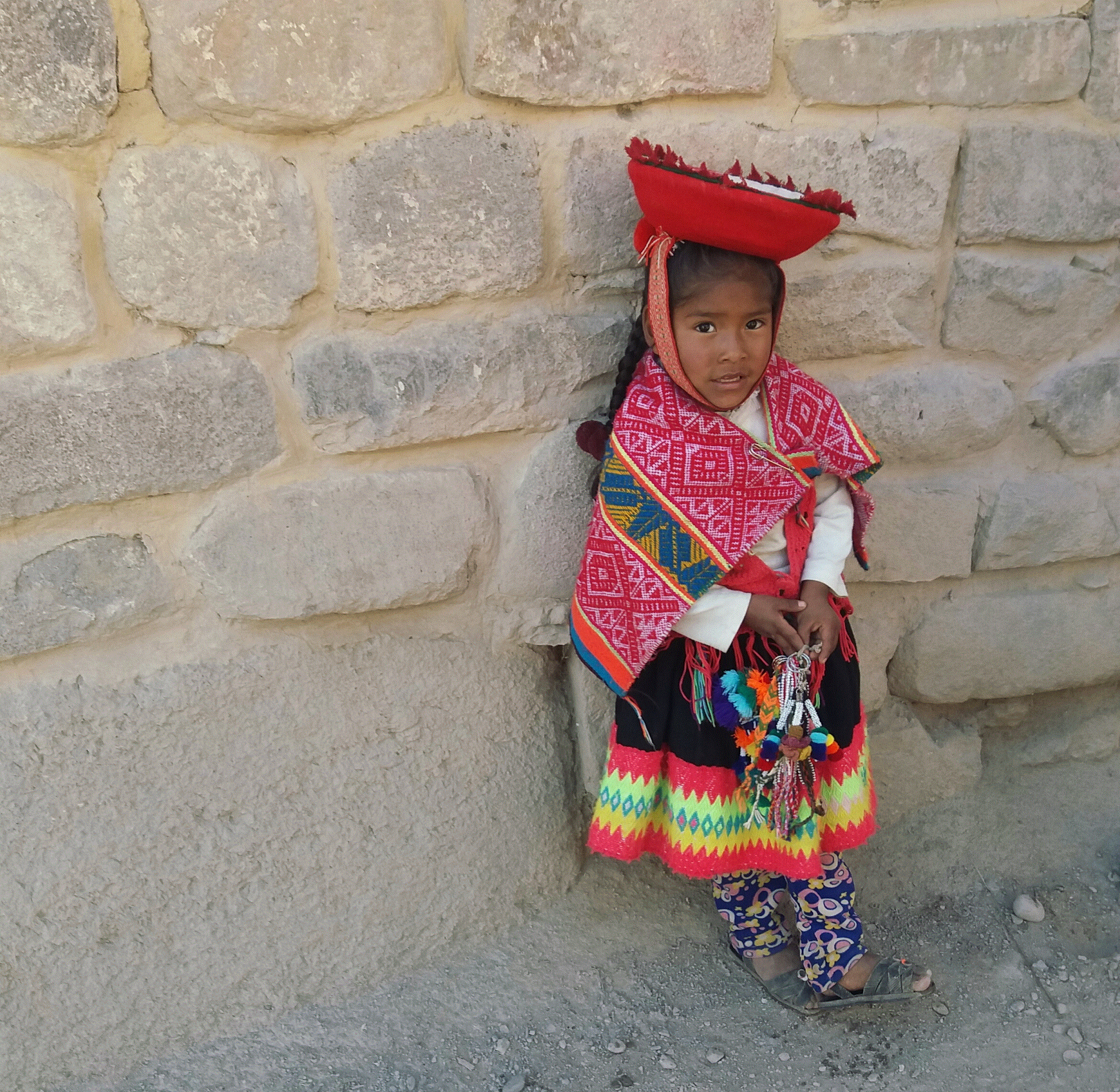 "This girl was trying to sell us key chains and accessories. She was dressed in the normal way indigenous locals dressed." Image and text by Dorothy Francis. Peru, 2017.