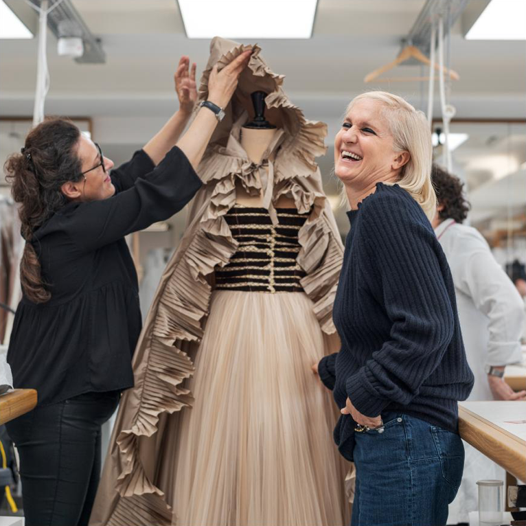 Fashion Trailblazer, France: Christian Dior artistic director Maria Grazia Chiuri breaks up in laughter as she and the couture studio head wrangle an elaborate cape. Chiuri’s 2016 appointment to the most prestigious position at Dior set off alerts in the fashion world: In its 72 years as a leading couture house, Dior had never before put a woman in charge. Chiuri has used fashion to promote women’s rights and issues; she’s dressed runway models in shirts saying “Sisterhood is powerful” and “We should all be feminists.” Image by Lynn Johnson. France, 2019.