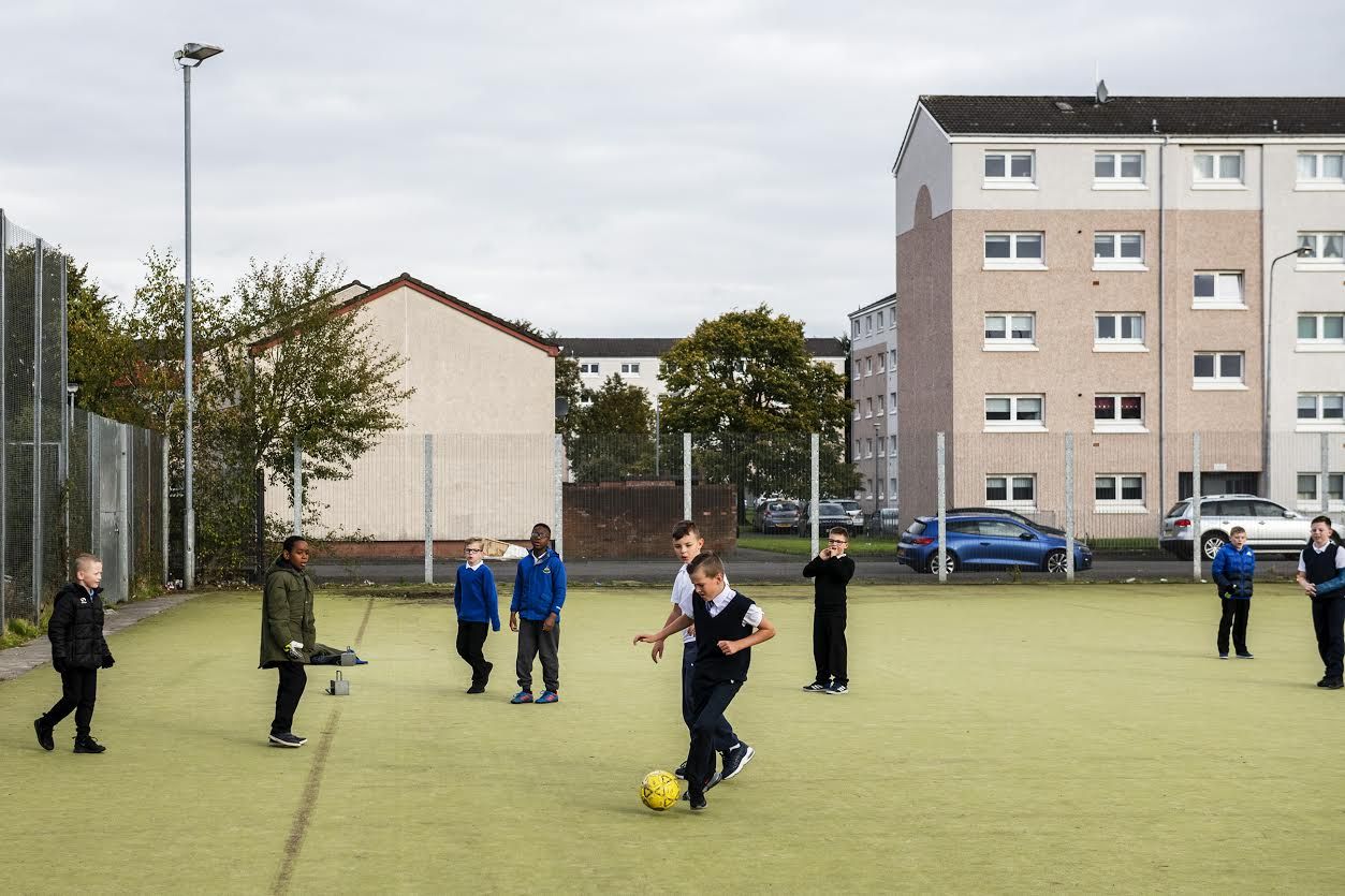 Students from  Dalmarnock Primary School play soccer, Wednesday, Oct. 23, 2019 at Dalmarnock Primary School in Glasgow, Scotland. Image by Michael M. Santiago/Post-Gazette. United Kingdom, 2019.