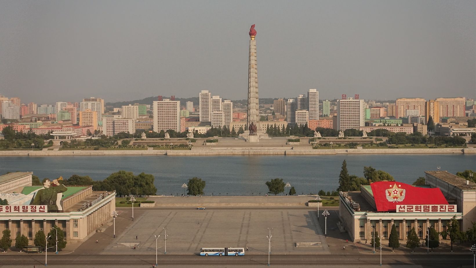 Kim Il-sung Square, against a backdrop of the Taedong river and the Juche Tower on the other side. Photo by Laya Maheshwari. Image by Laya Maheshwari. North Korea, 2016.  