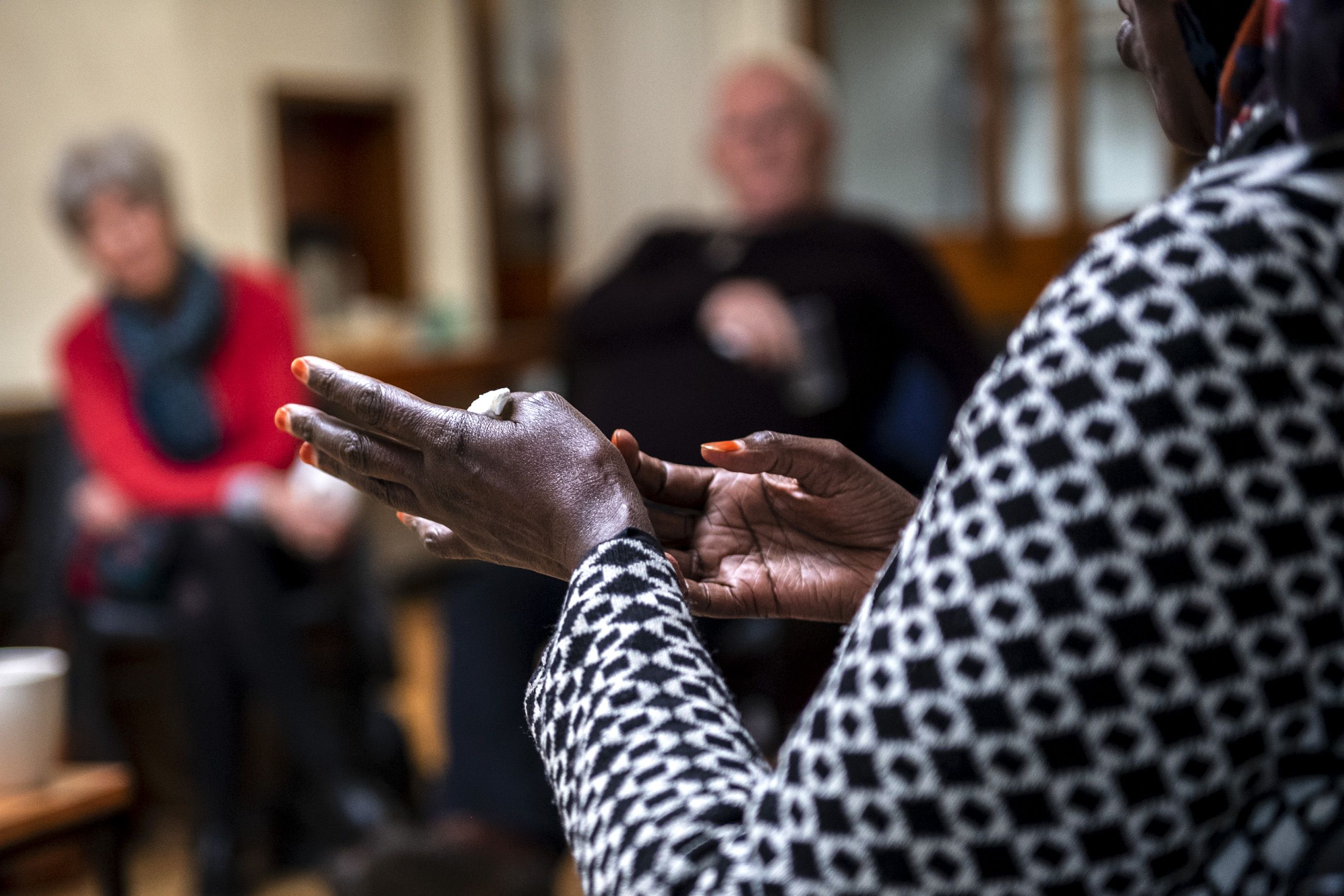 Sadia Ahamed, of City Centre, speaks during the monthly Poverty Truth Community meeting. Image by Michael Santiago. United Kingdom, 2019.