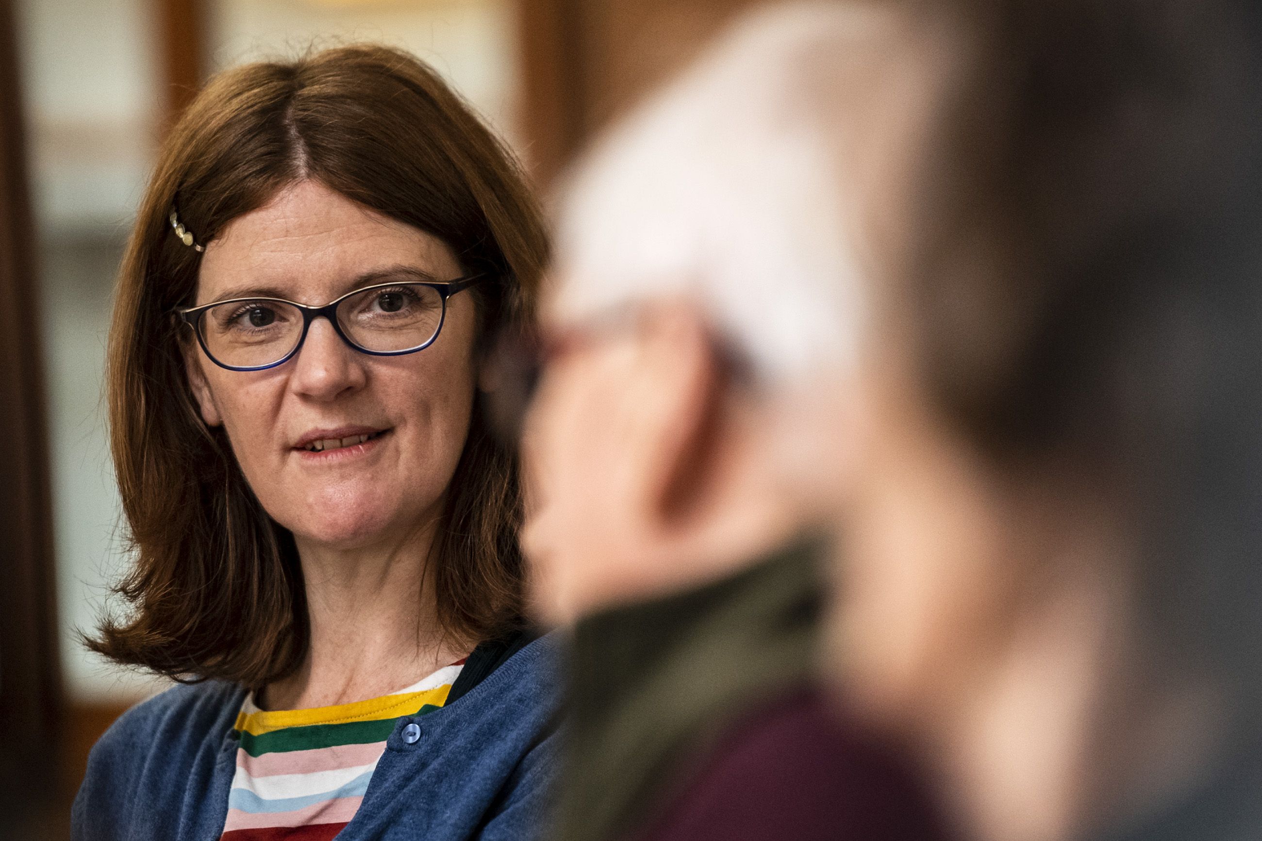 Elaine Downie, coordinator of the Poverty Truth Community, speaks during the monthly Poverty Truth Community meeting. Image by Michael Santiago. United Kingdom, 2019. 