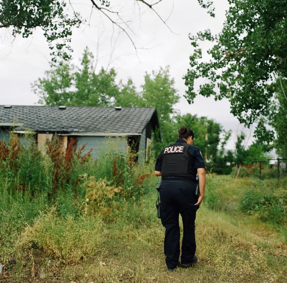 Coretta Greybear visits on old case she investigated where 13-month-old Kenzley Olson was found dead in a trash can. Image by Sara Hylton. United States, 2019.