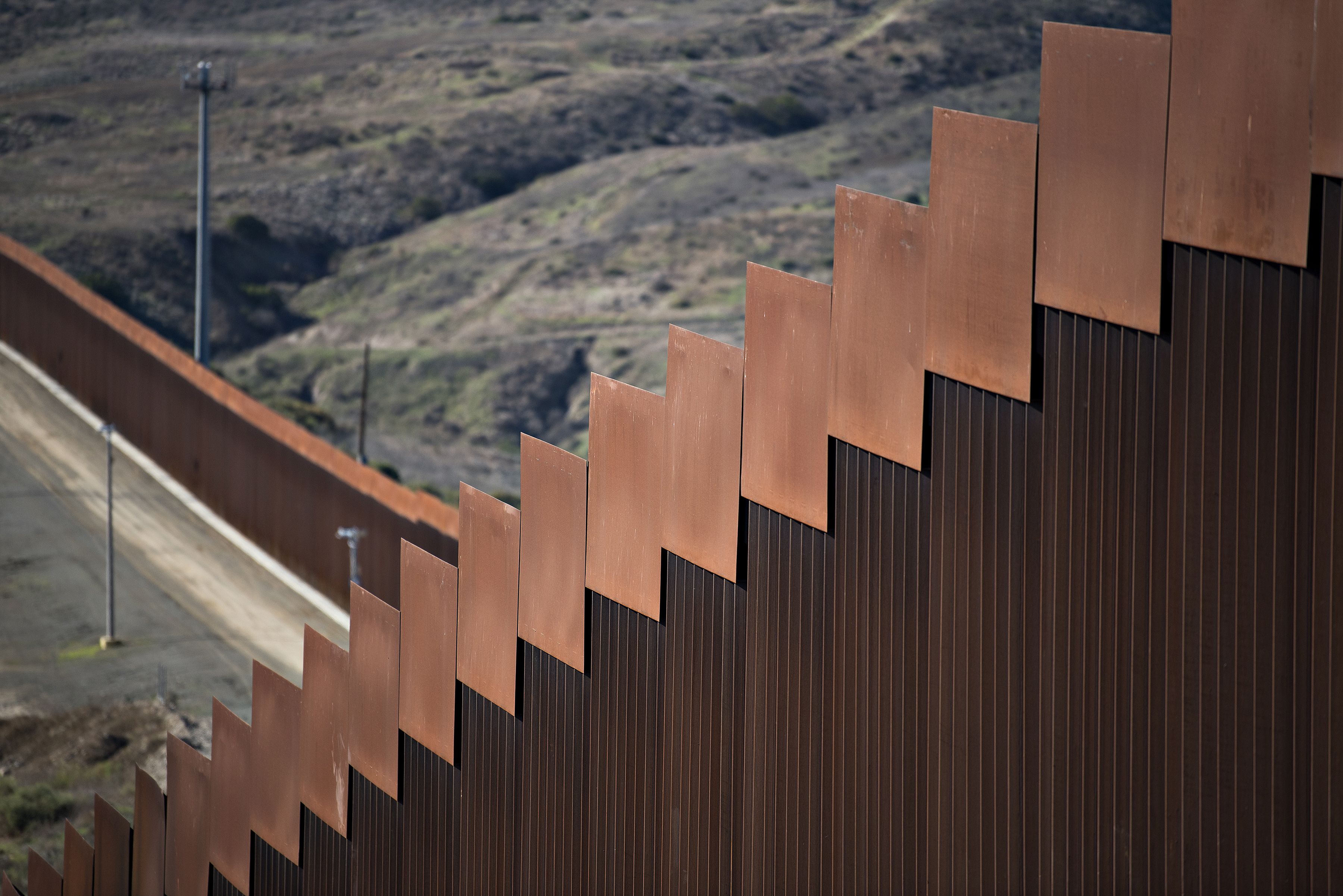The border wall in the Libertad Parte Alta neighborhood near the Tijuana airport Dec. 1. Image by Amanda Cowan. Mexico, 2019.