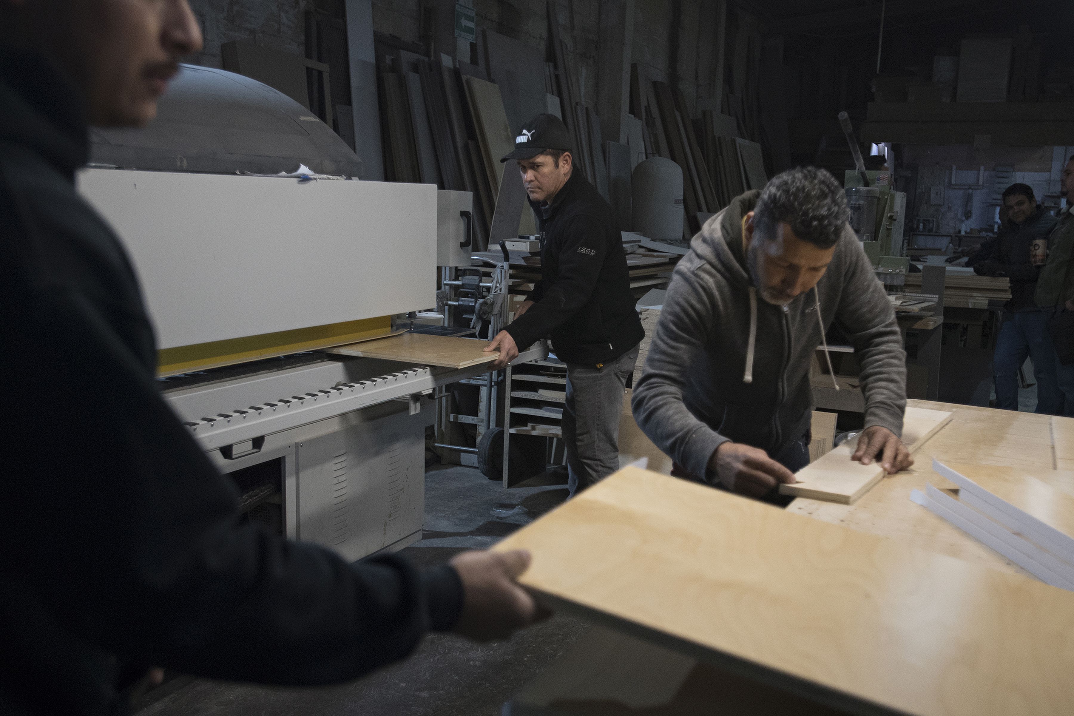 Ramon Flores makes custom cabinets for work in Tijuana. When Flores lived in Vancouver, he owned his own successful business. Image by Amanda Cowan. Mexico, 2019.