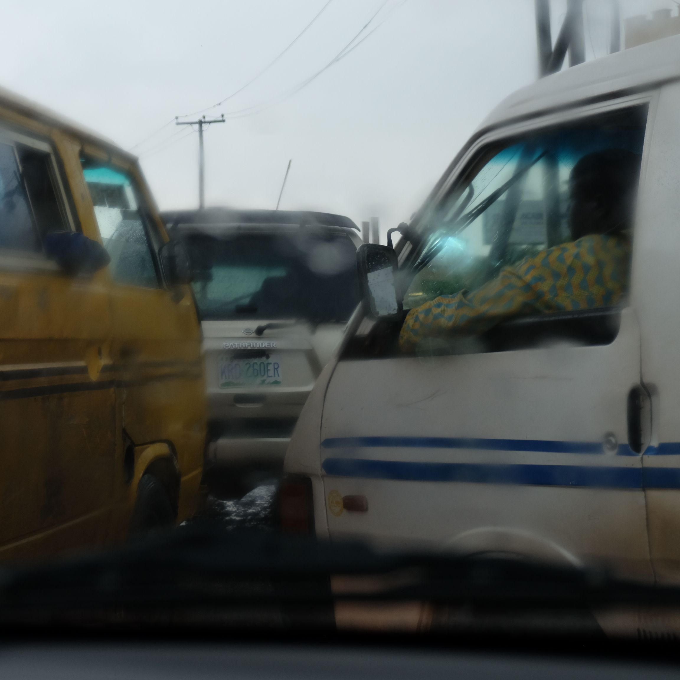 The intensity of Lagos' ferocious traffic jams can be almost hallucinatory in the first hours of one's arrival. Image by T.R. Goldman. Nigeria, 2017.
