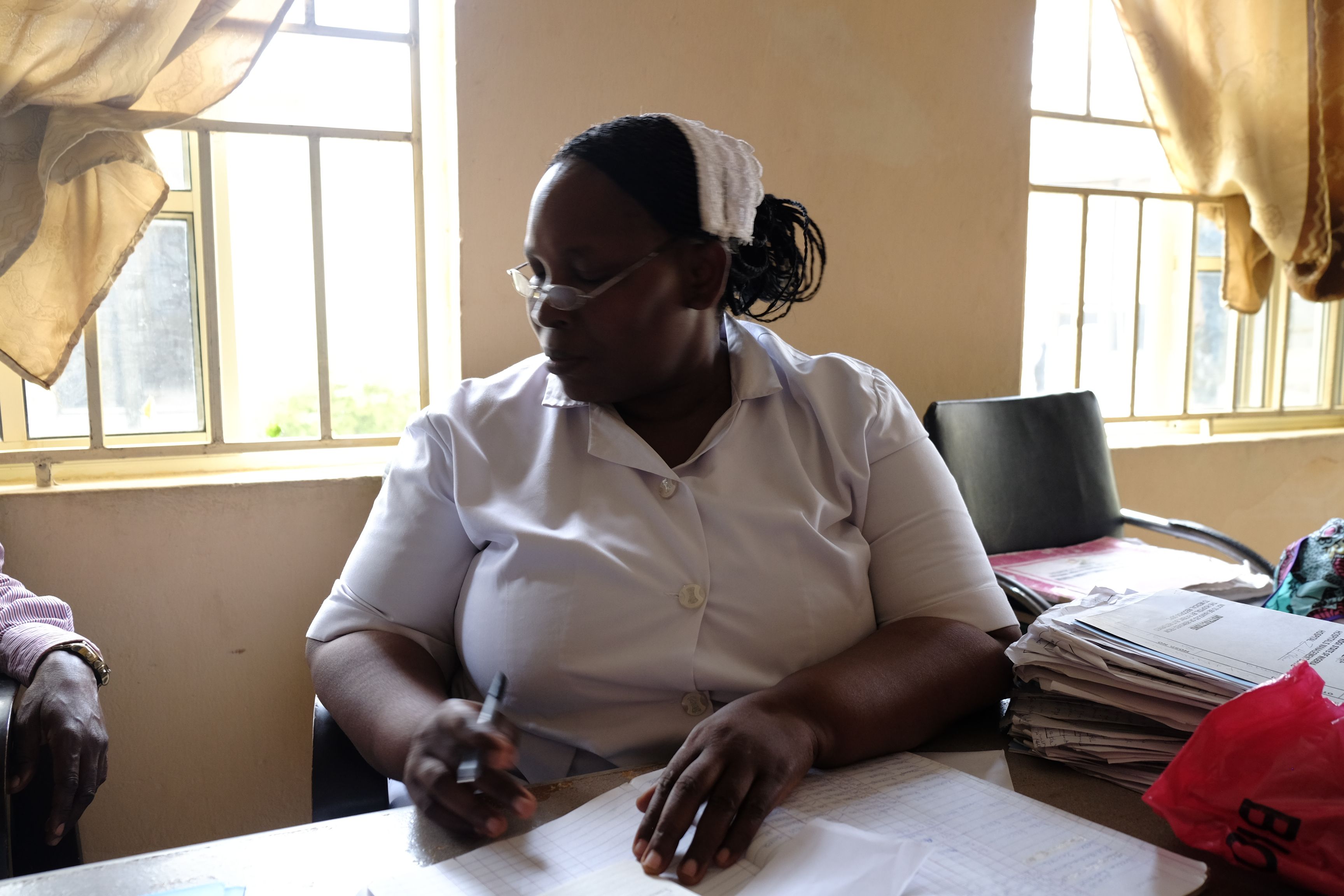 Nurse Sallu Bose, the maternity ward matron at the Okene Zonal Hospital in Kogi State, Nigeria, has worked at the hospital 25 years. Image by T.R. Goldman. Nigeria, 2017.