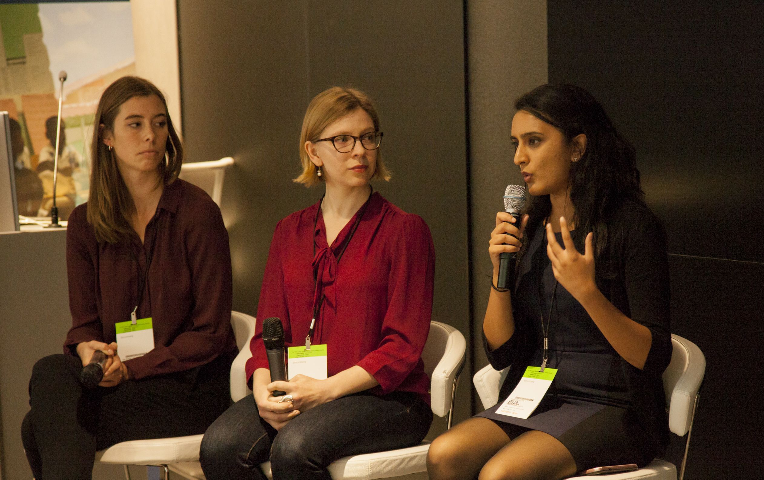 Student Fellow team, Thea Piltzecker and Liz Scherffius (Columbia University Graduate School of Journalism) listening to Divya Mishra (Johns Hopkins Bloomberg School of Public Health) during the Q&A for The Refugee Experience Panel at 2018 Washington Weekend. Image by Jin Ding. United States, 2018.