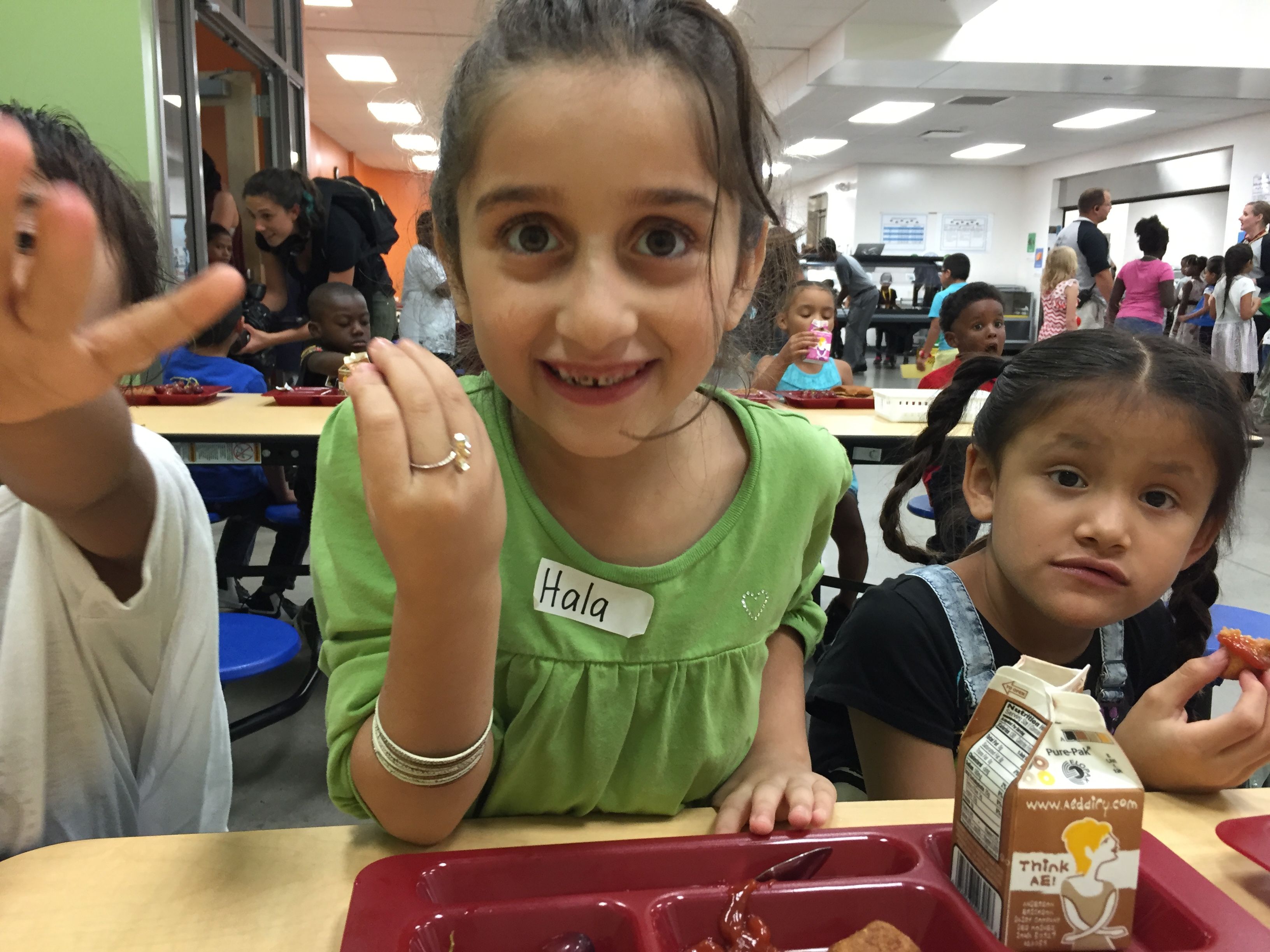 All summer long, the kids talk about starting school. "I'm so excited to learn," Hala says on her first day.