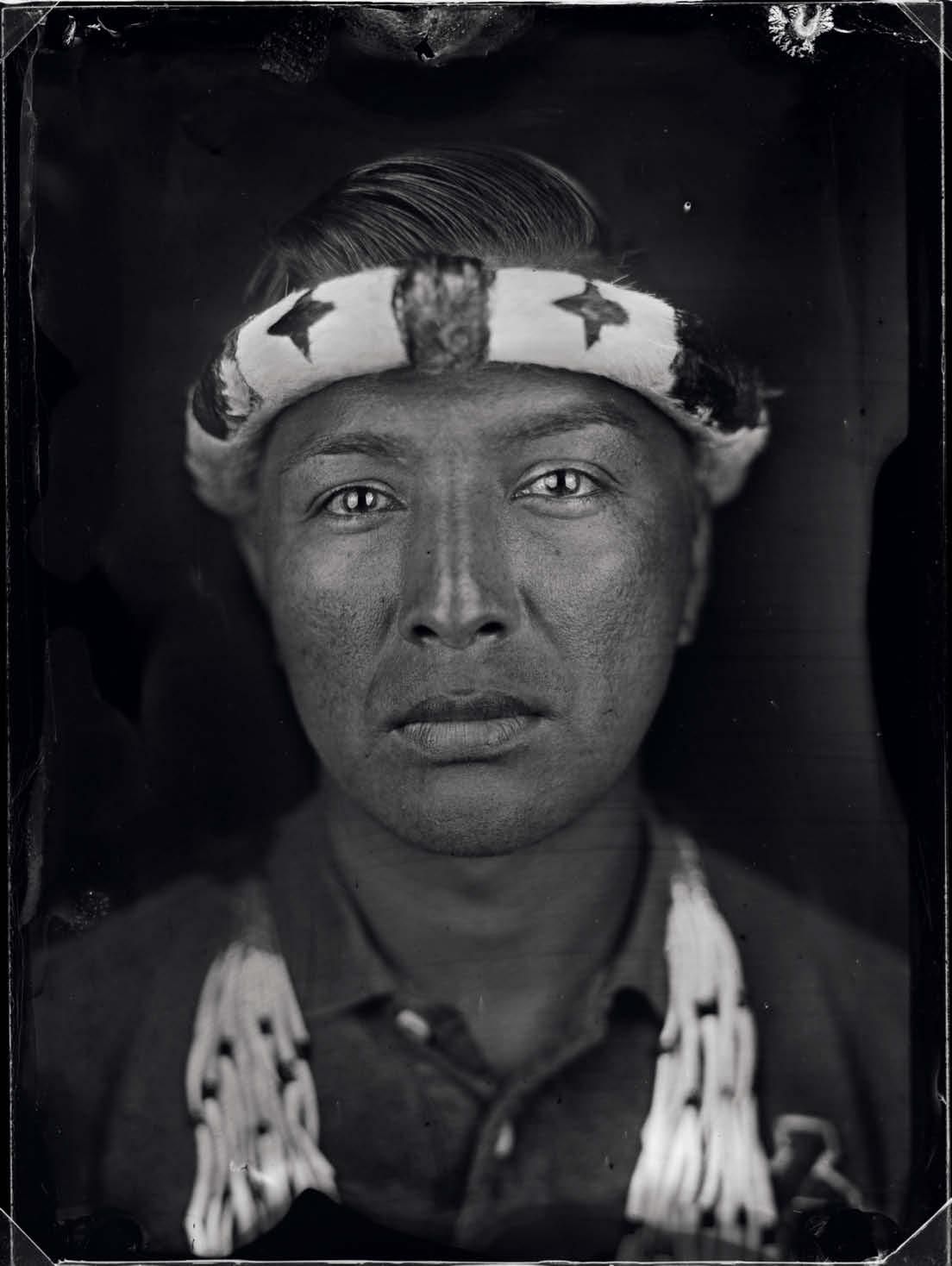 Ralph Peters III of the Hupa tribe in Hoopa Valley, California. After the United States took control of Alta California in 1846, extermination campaigns reduced the indigenous population from 150,000 to 30,000 in less than thirty years. The US government recognized Hupa sovereignty over their land in 1864. Many still live there today. Image by Tomas Van Houtryve. California, 2018.