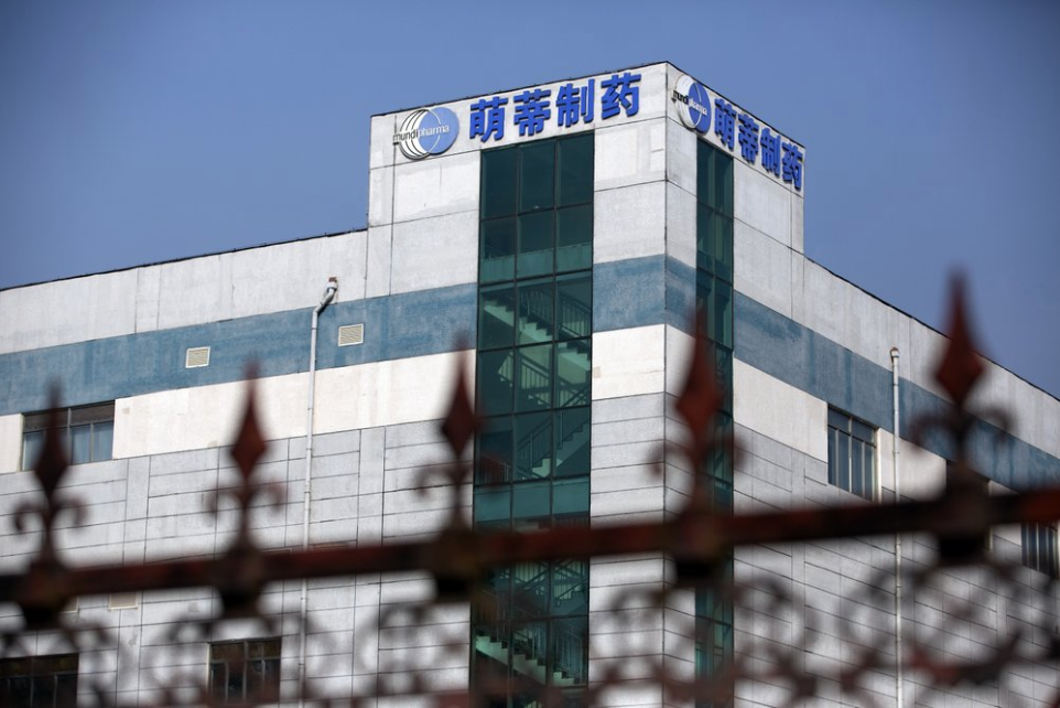 This Sept. 27, 2019 photo shows a Mundipharma facility in an industrial park on the outskirts of Beijing, China. As the Sackler's U.S. empire collapses, Mundipharma, which is also owned by the family, is using the same tactics to peddle opioids in China. Image by Mark Schiefelbein / AP Photo. China, 2019.