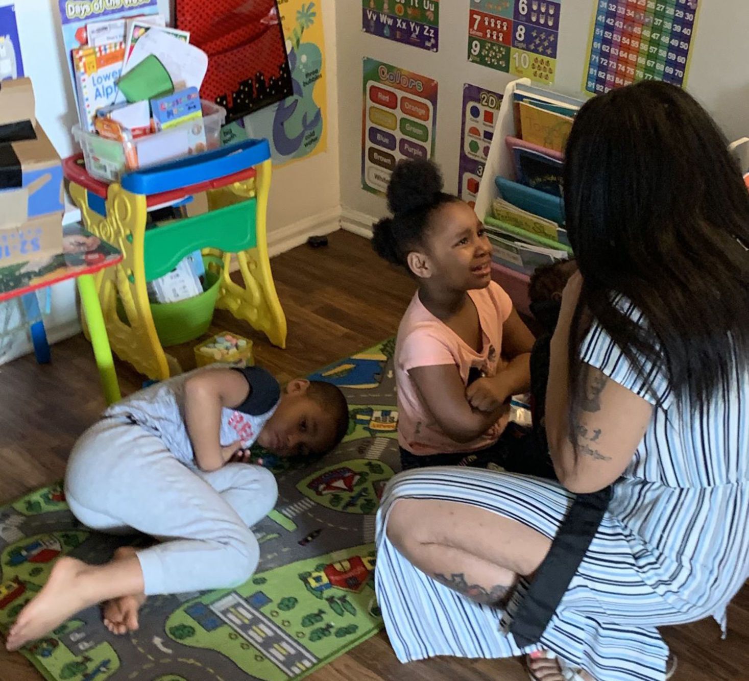 Tyra Johnson struggled to get her young children through the first day of school at home. Image by Aisha Sultan / Post-Dispatch. United States, 2020.