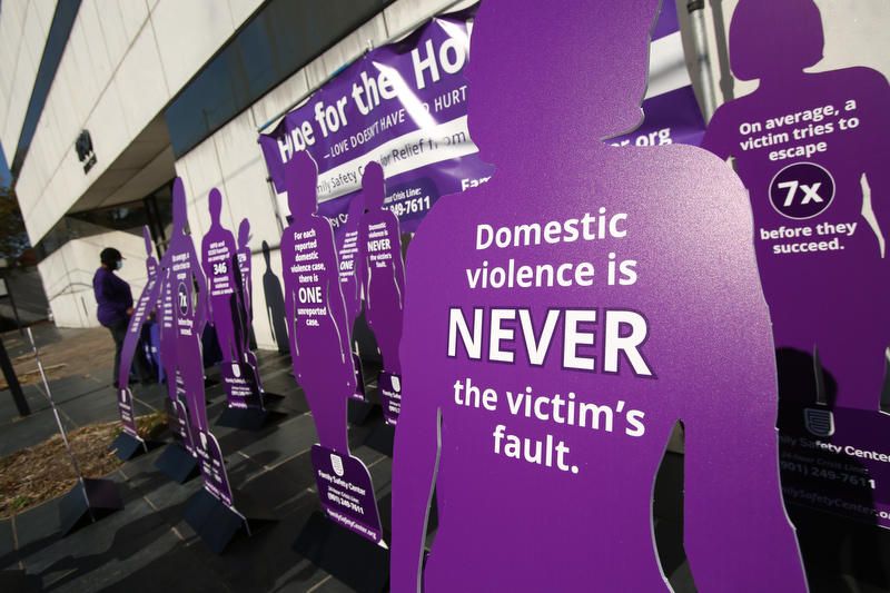 A display from a Nov. 17 Silent Witness Memorial at the Family Safety Center in Memphis, remembering victims of domestic violence. Image by Karen Pulfer Focht. United States, 2020.