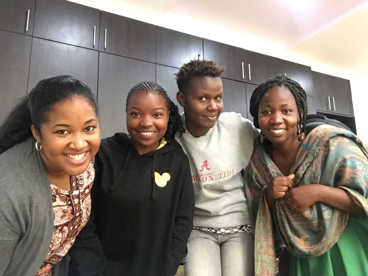 Janelle Richards with two akirachix students and journalist Rael Ombuor. Image by Janelle Richards. Kenya, 2017.