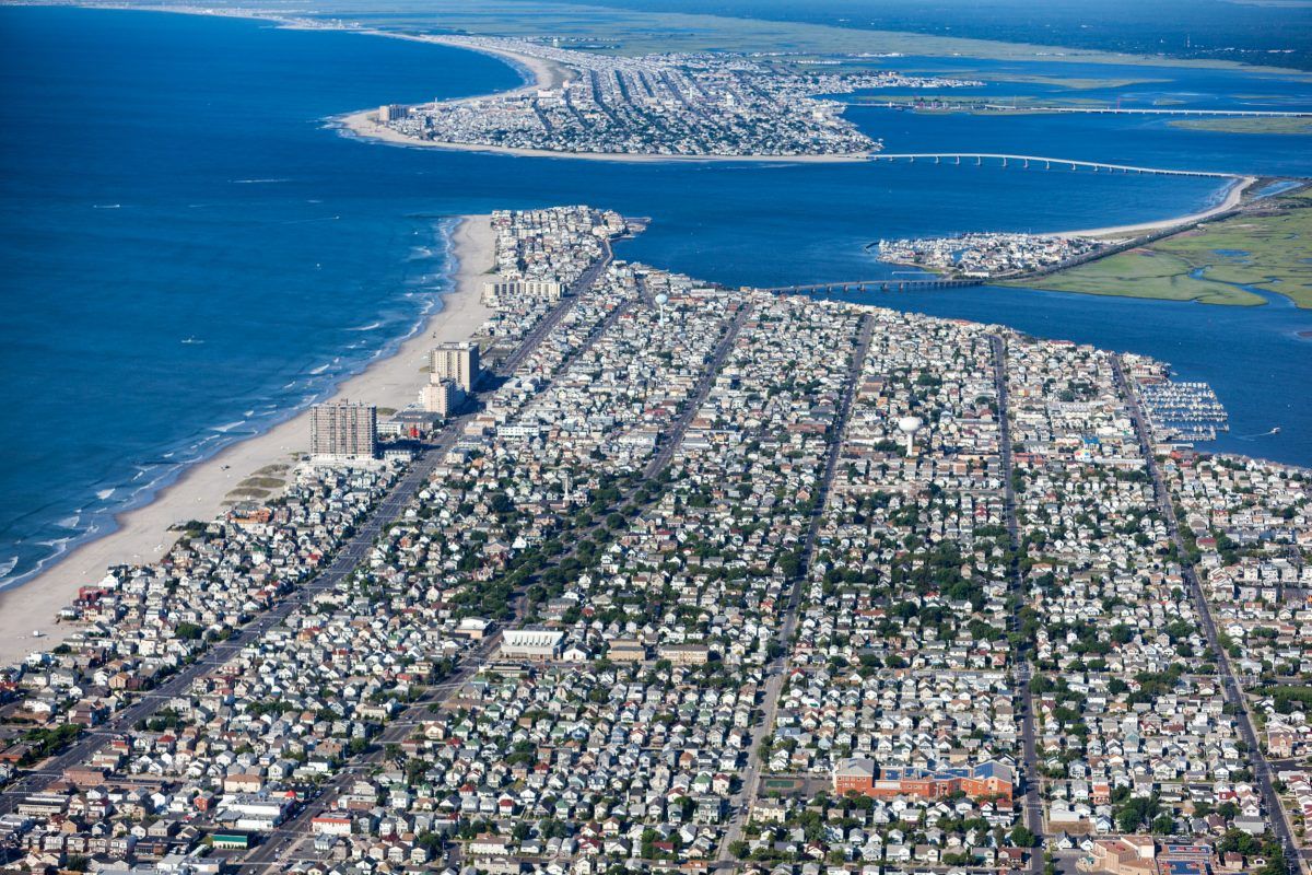 Looking south at Ventnor City on Absecon Island, just south of Atlantic City. “It’s a wonderful place to live,” says MacLean, “until a hurricane strikes or sea level starts to take hold.” The average elevation of the city is less than a meter above sea level, making it unusually vulnerable to sea level rise and storm surges. Minor flooding episodes in Ventnor City are eight times more common today than in the middle of the 20th century. Image by Alex MacLean. United States, 2019.