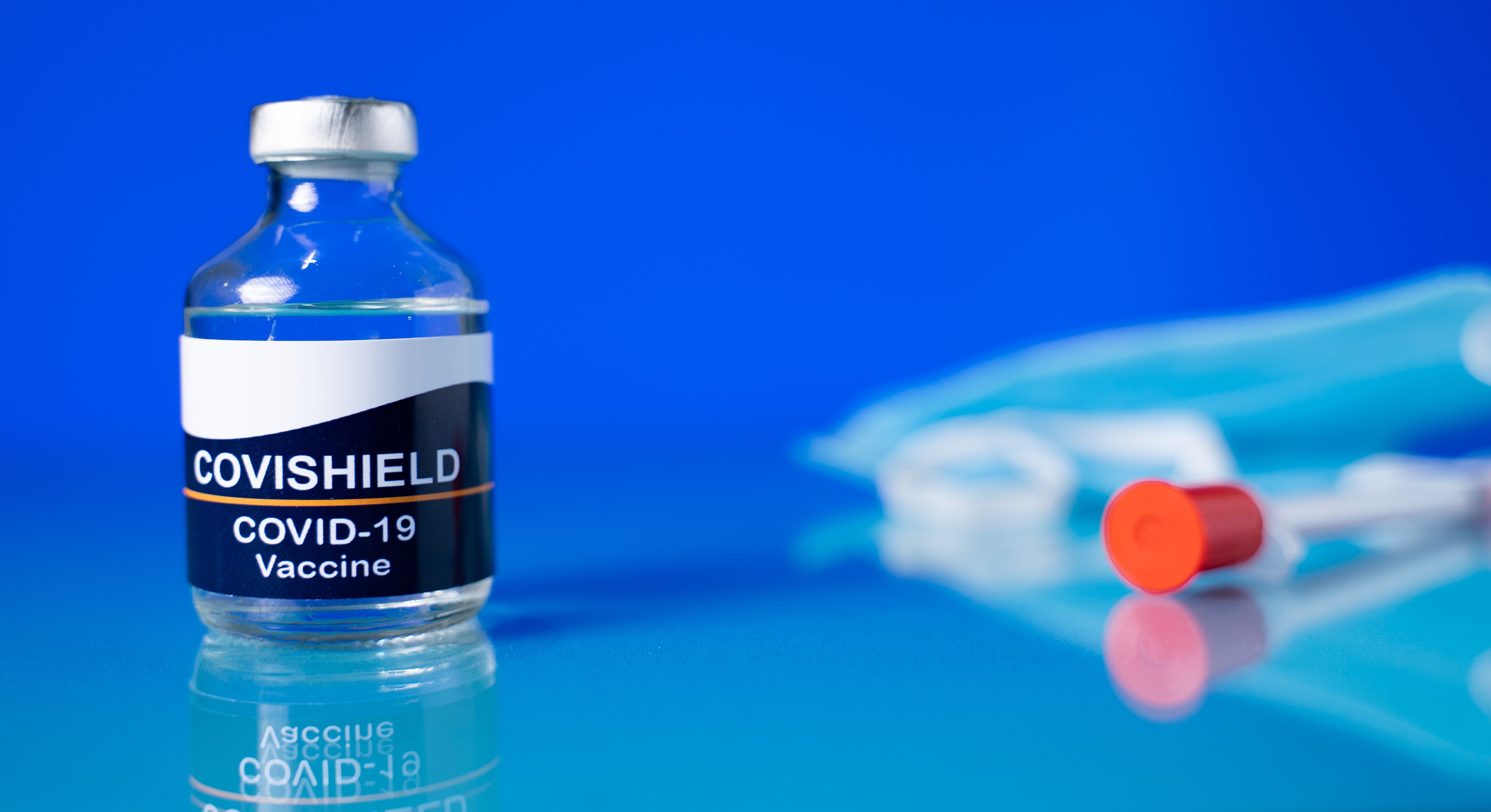 A mock-up of the Serum Institute of India's Covishield vaccine. Image by lakshmiprasada S / Shutterstock. India, 2020.