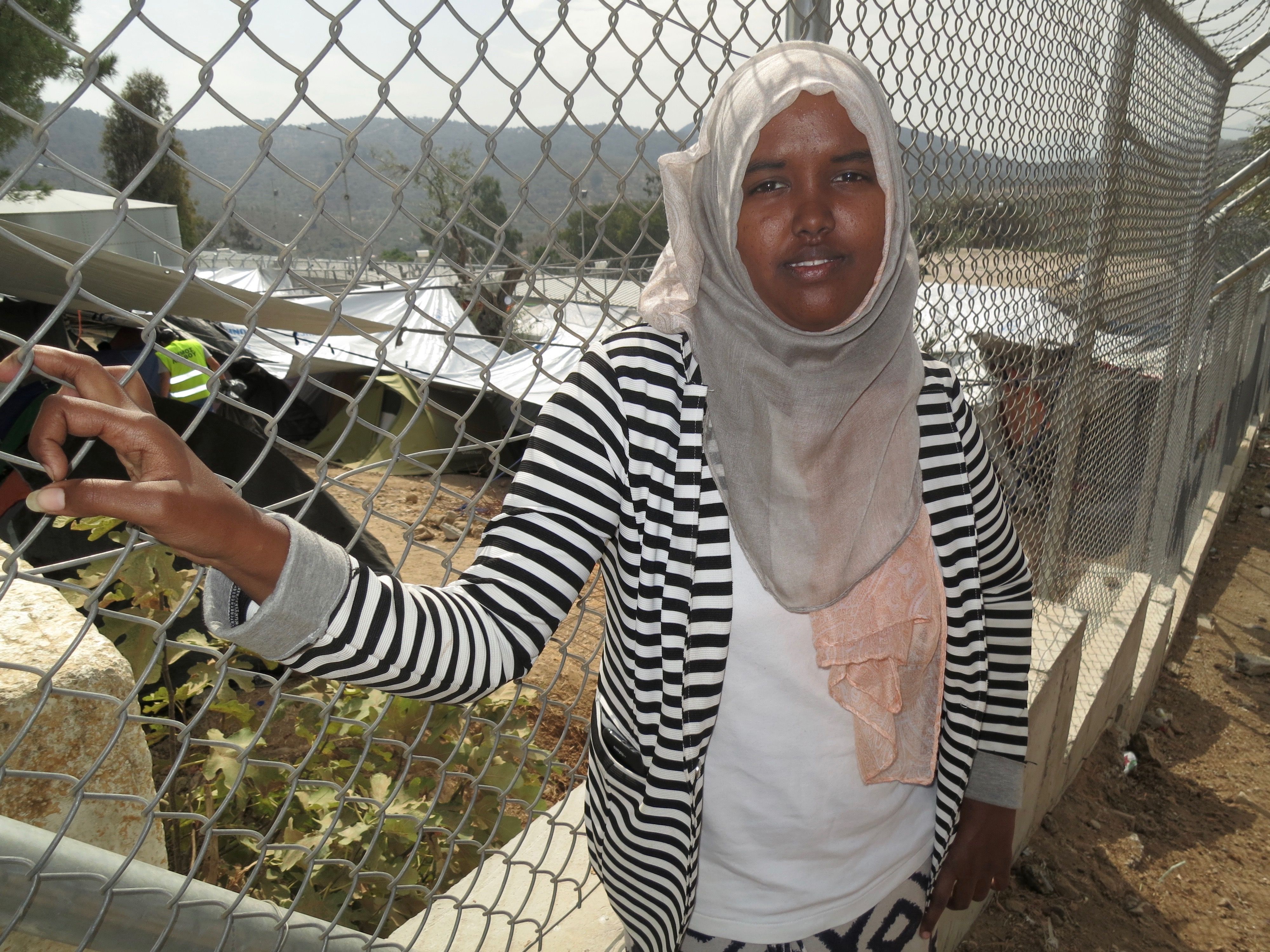 After being targeted by Al-Shaabab for being a journalist, Kowthar Adraman fled Somali. She is now in Moria refugee camp on Lesbos, Greece and seeks asylum in Europe. Image by Jeanne Carstensen. Greece, 2016. 