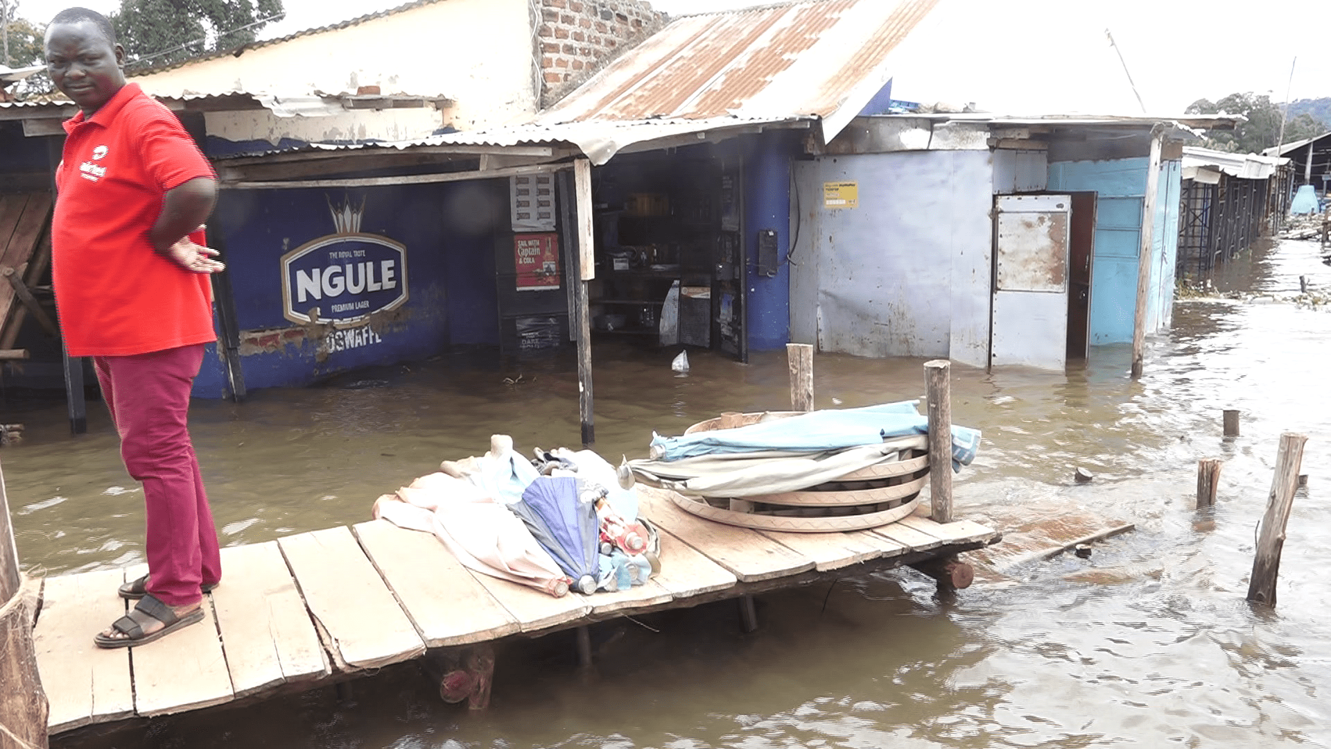 Flooded Ggaba market in Luzira, Kampala after Lake Victoria burst its banks. Image by Noah Omuya. Uganda, 2020.