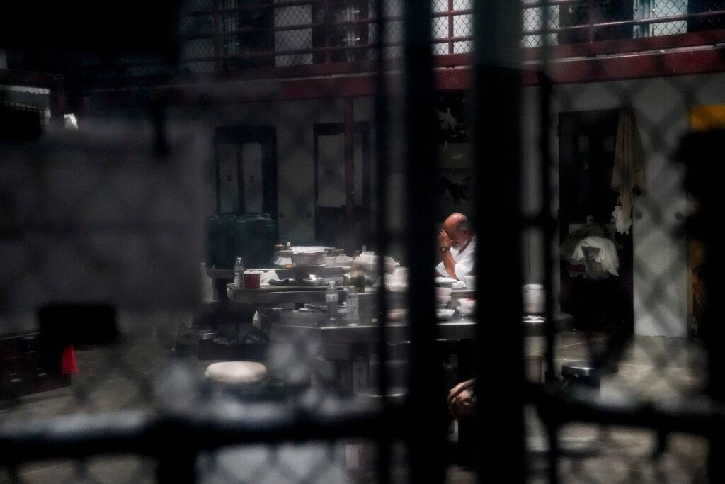 A detainee at Camp 6 of the Guantánamo Bay detention camp in 2019. Coronavirus protection measures led to cancelation of some meetings between detainees and delegates from the International Committee of the Red Cross. Image by Doug Mills/The New York Times. United States, 2019.