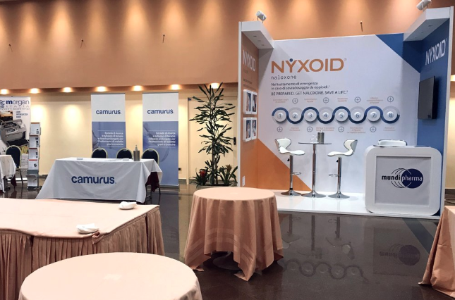 This undated image provided by Dr. Andrew Kolodny shows Purdue Pharma’s international affiliate, Mundipharma, promoting Nyxoid, a new brand of opioid overdose reversal medication, at a medical conference in Italy. The photo was taken by Kolodny, a frequent critic of Purdue Pharma who has testified against the company. Image by Andrew Kolodny via AP.