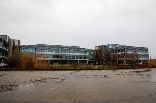This Dec. 12, 2019, photo shows a sign at the Mundipharma International headquarters at Cambridge Science Park in England. Mundipharma is the international affiliate of Purdue Pharma, the maker of the blockbuster painkiller OxyContin. Mundipharma is now marketing Nyxoid, a new brand of naloxone, an opioid overdose reversal medication. Image by Leila Coker / AP Photo. United Kingdom, 2019.