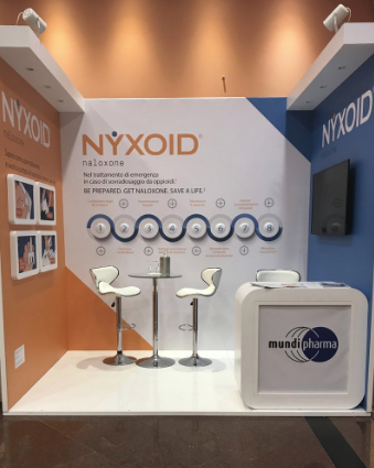 This undated image provided by Dr. Andrew Kolodny shows Purdue Pharma’s international affiliate, Mundipharma, promoting Nyxoid, a new brand of opioid overdose reversal medication, at a medical conference in Italy. The photo was taken by Kolodny, a frequent critic of Purdue Pharma who has testified against the company. Image by Andrew Kolodny via AP. Italy, undated.