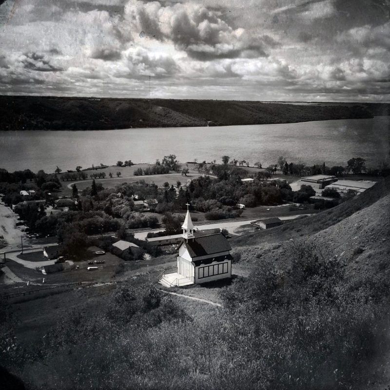 This picturesque little village is Lebret, Saskatchewan — home to the Qu’Appelle Indian Residential School, which operated under the federal government and Catholic Church from 1884-1969, and under the governance of the Star Blanket Cree Nation from 1973-1998. While most of the original school structures have been demolished, one building remains, visible on the far right side of the photo. Image by Daniella Zalcman. Canada, 2016.