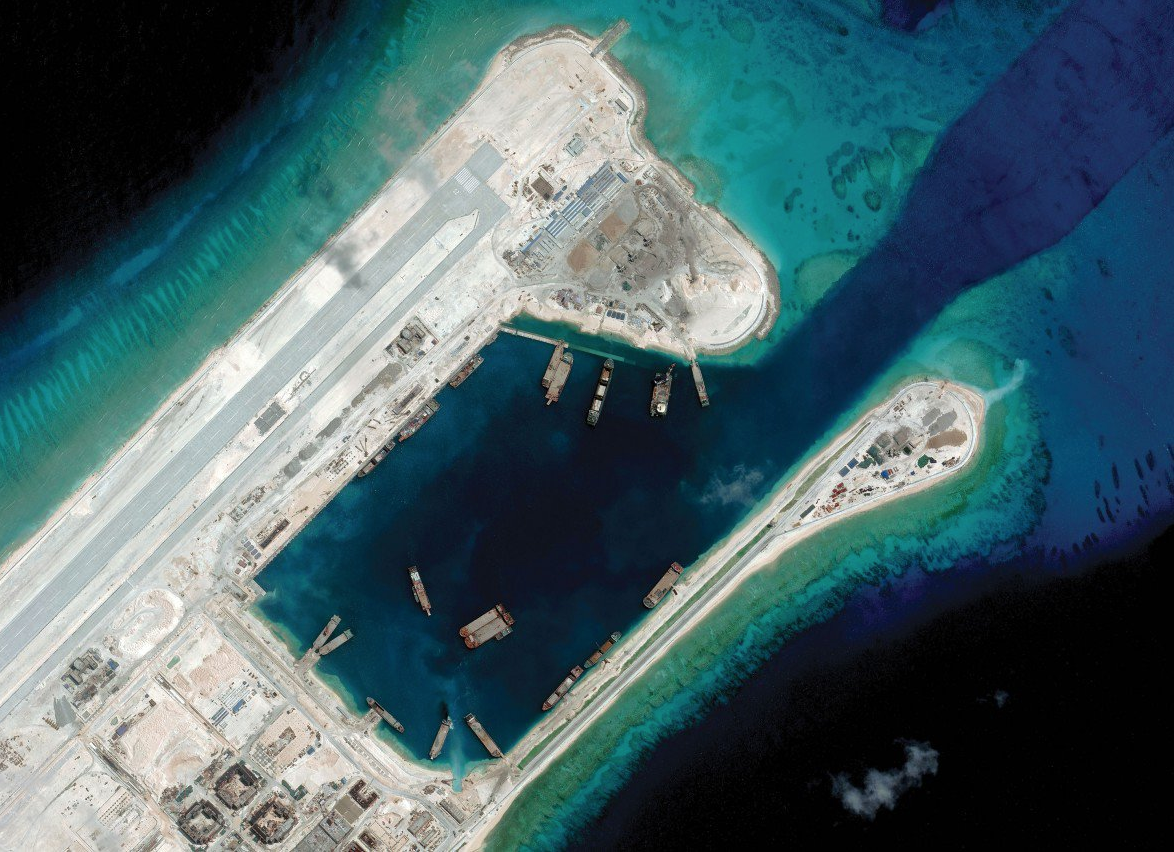 Fiery Cross Reef, an artificial island built by China, boasts a two-mile long runway, massive harbor, and elaborate military fortifications. Image courtesy of CSIS ASIA MARITIME TRANSPARENCY INITIATIVE/DIGITALGLOBE. China, 2018.