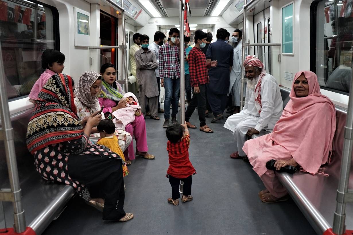 Passengers for the Orange Line in Lahore. Image by Sabrina Toppa. Pakistan, 2020.