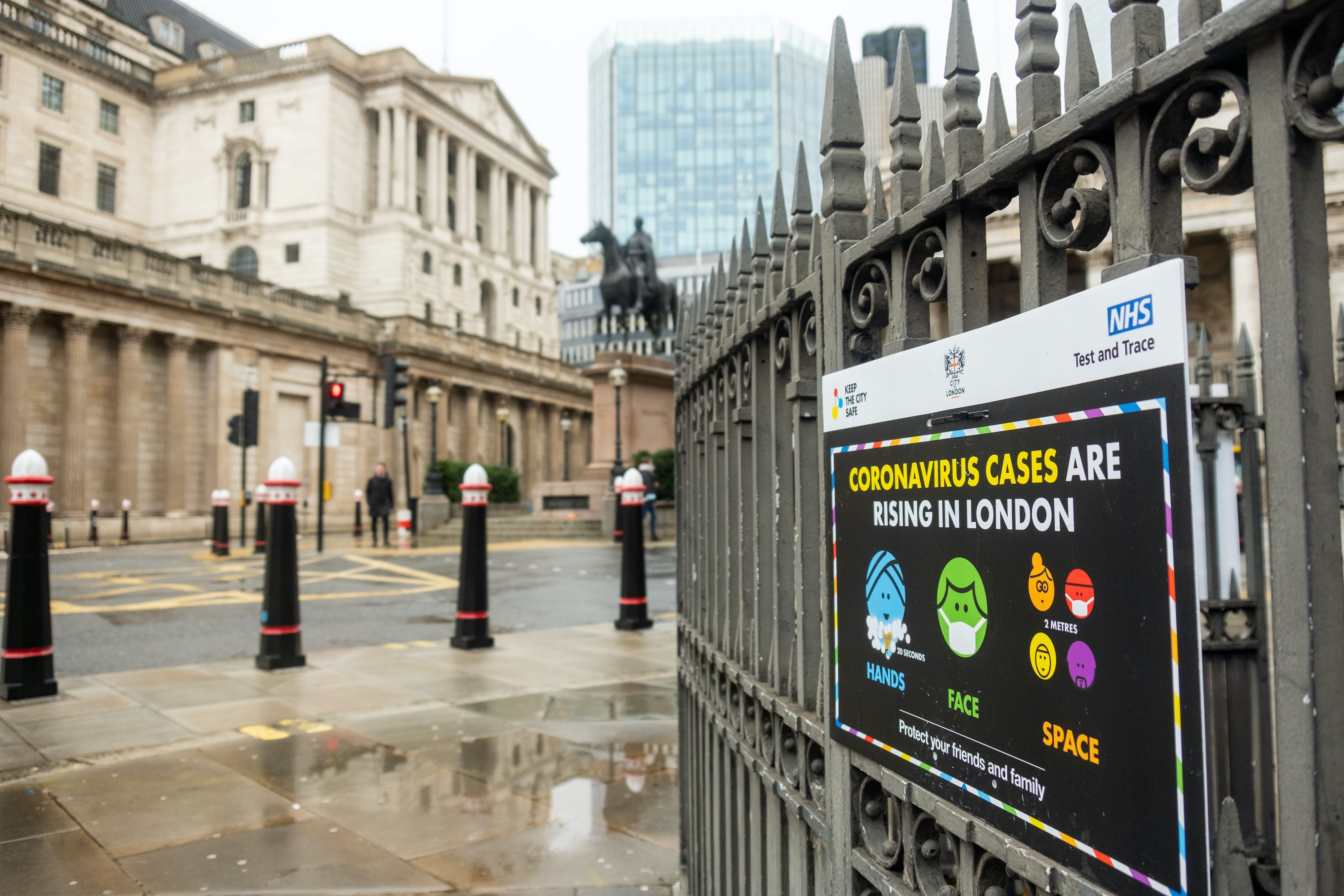 On December 21st, a sign warning of rising coronavirus cases outside the Bank Of England in days following London entering Tier 4 lockdown. Image by Willy Barton / Shutterstock. United Kingdom, 2020.