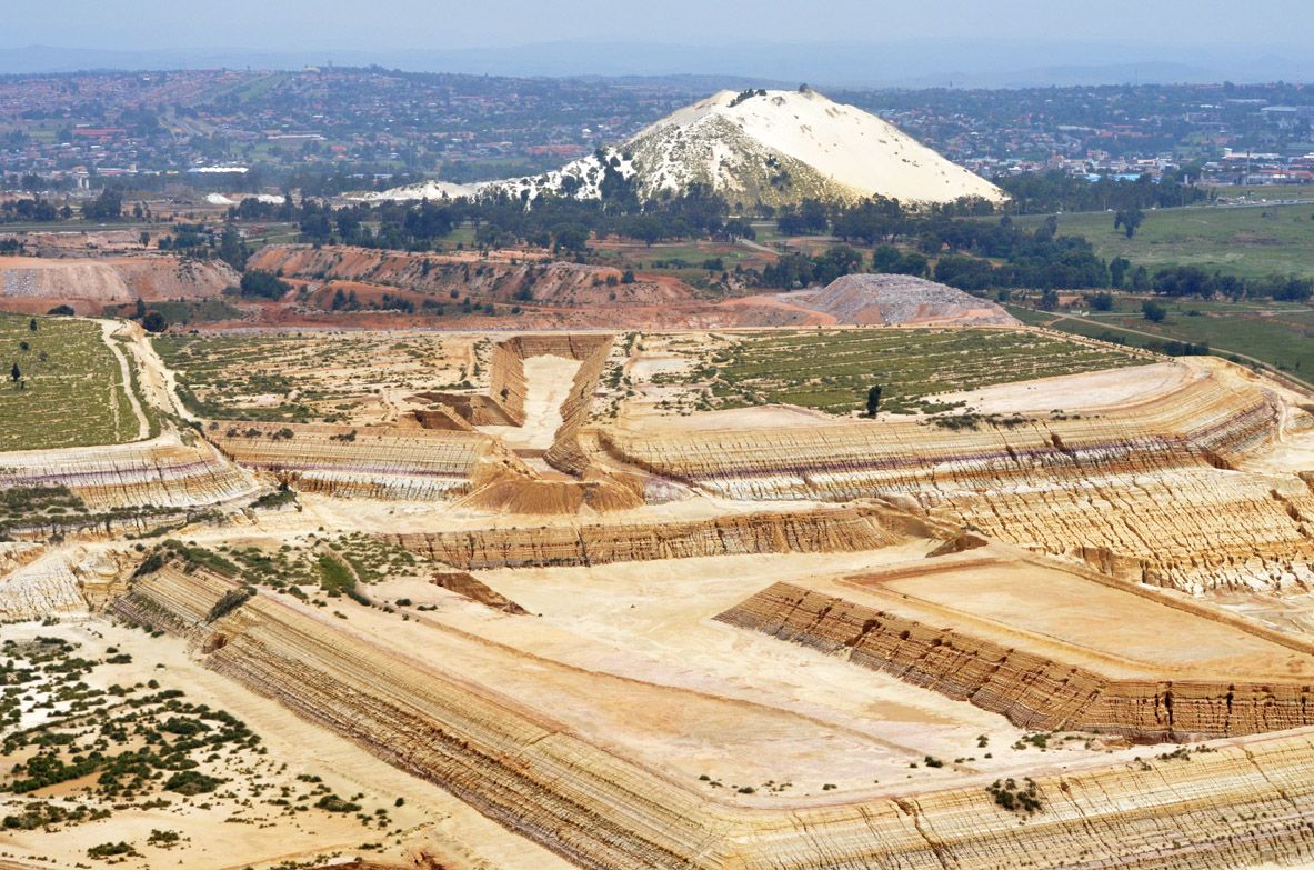 An aerial view of one of Mintails Mining South Africa (Pty) Ltd's mining rights shows extensive, unremediated mine waste. Image by Mark Olalde. South Africa, 2016.