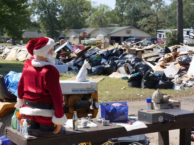 A yard sale of a few undamaged items one resident of Bevil Oaks salvaged from a devastated home. Image by Daniel Grossman. United States, 2017.