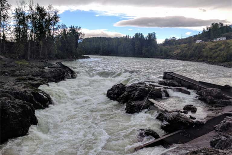 The falls on the Bulkley River at Moricetown, a settlement of the Witsuwit’en people, where clans and families have gathered every summer for thousands of years to catch salmon. This year, owing to low sockeye harvests, the tribe voluntarily closed the river to fishing. Image by Saul Elbein. Canada, 2017.