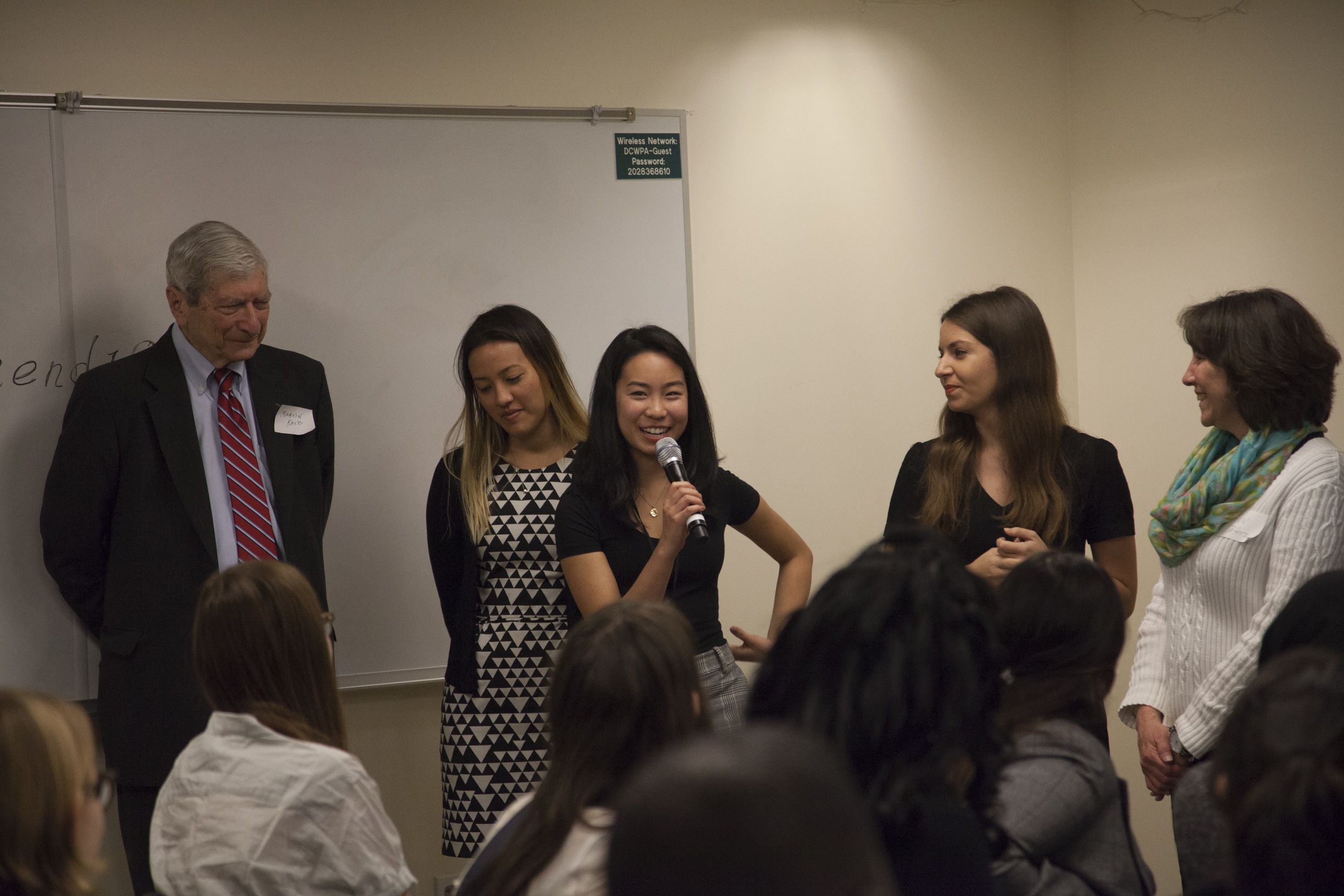 Pulitzer Center intern Ashley Zhang introduces herself to student fellows. Behind her are Pulitzer Center staff Marvin Kalb, Julia Kelmers, Hannah Berk, and Ann Peters. Image by Jin Ding. United States, 2018.