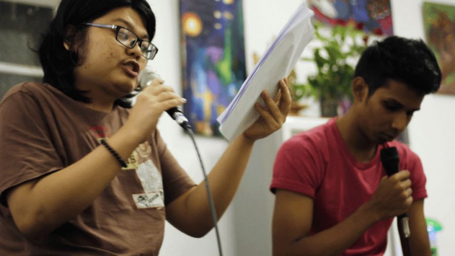 Muslim Myanmar poet Than Toe Aung collaborated with a Buddhist friend, Aung Kaung Myat, to write a poem about their different experiences growing up Buddhist and Muslim. The poem was about privilege. Image by Shaina Shealy/The World. Myanmar, 2019.