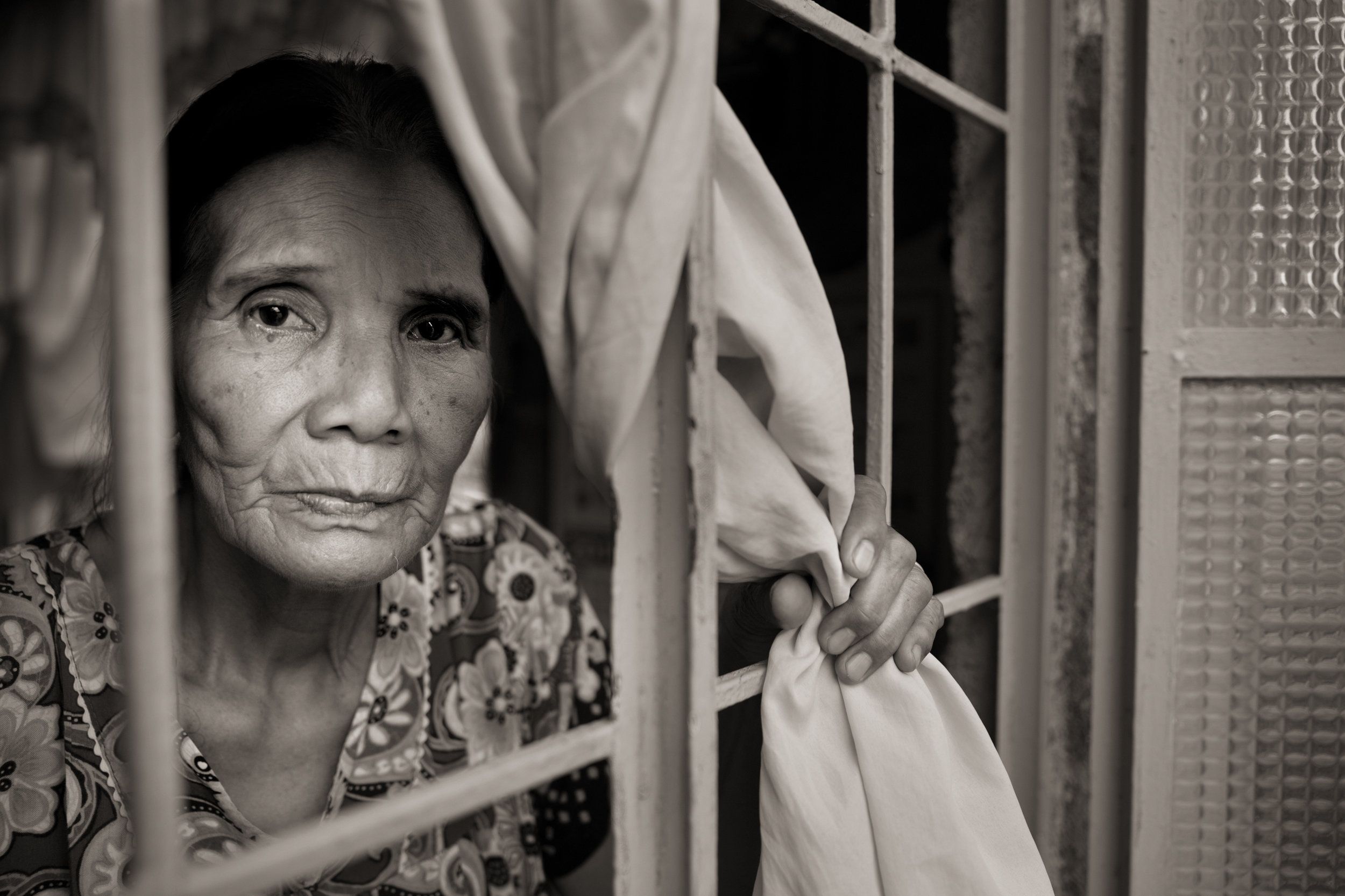 Perla Bulaon Balingit said she still has flashbacks of the atrocities she suffered at the hands of Japanese soldiers and wonders, "How were they able to do that to another human as a human being?" Image by Cheryl Diaz Meyer. Philippines, 2019.