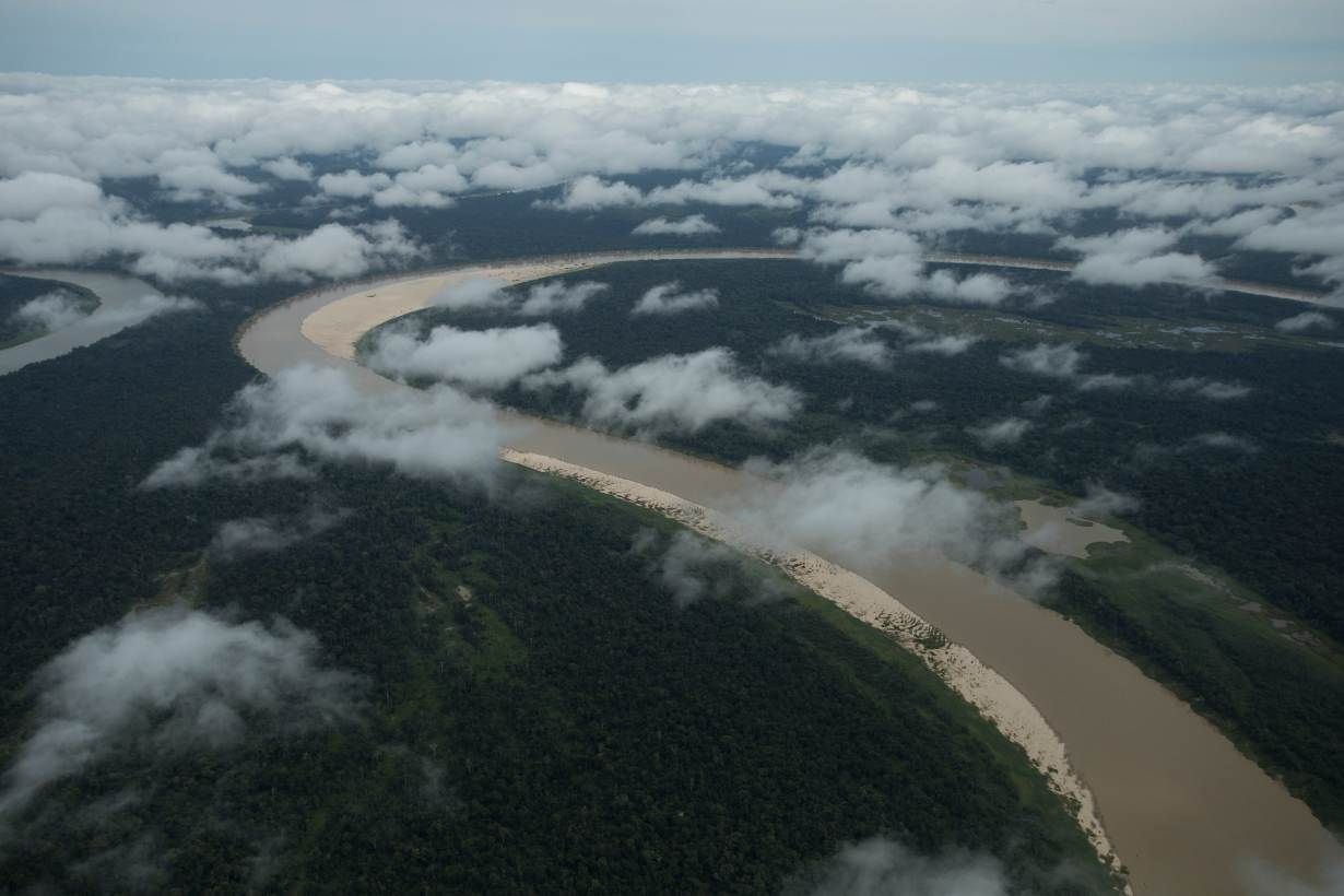 The winding Juruá River and the Middle Juruá Extractive Reserve, seen from an airplane, Amazonas, Brazil, October 19, 2019. Image by Bruno Kelly/Thomson Reuters Foundation. Brazil, 2019.
