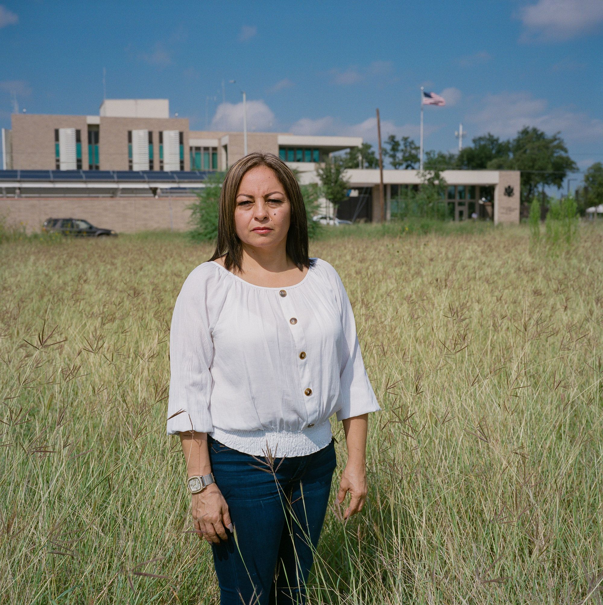 Maria Elena Dominguez in front of the United States Consulate in Nuevo Laredo, Mexico. Image by by Christopher Lee. Mexico, 2020.