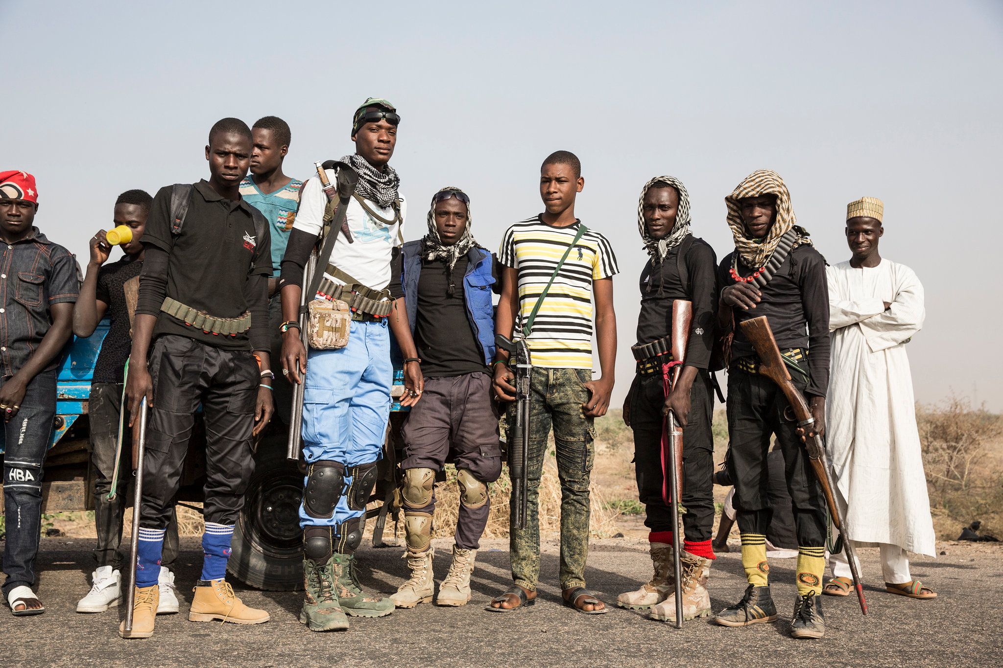 Volunteers with the Civilian Joint Task Force, which assists the military in the struggle against Boko Haram. Image by Glenna Gordon. Nigeria, 2017.