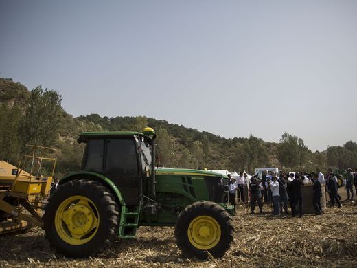 A demonstration of a Vermeer corn stalk baler is given during the groundbreaking of the China-US Demonstration Farm on Saturday, Sept. 23, 2017, in Luanping County, Hebei. Image by Kelsey Kremer. 