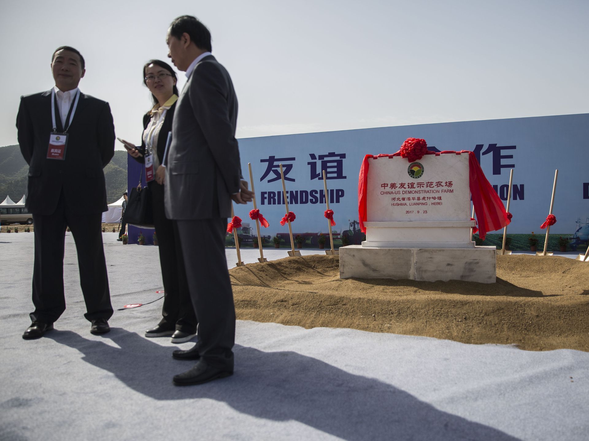 Representatives from Chinese and Iowan agriculture industries attend the groundbreaking ceremony for the China-U.S. Demonstration Farm on Saturday, Sept. 23, 2017, in Luanping County, Hebei, China. The farm is being built based on the farm that Chinese President Xi Jingping visited in Iowa in 2012. Image by Kelsey Kremer.