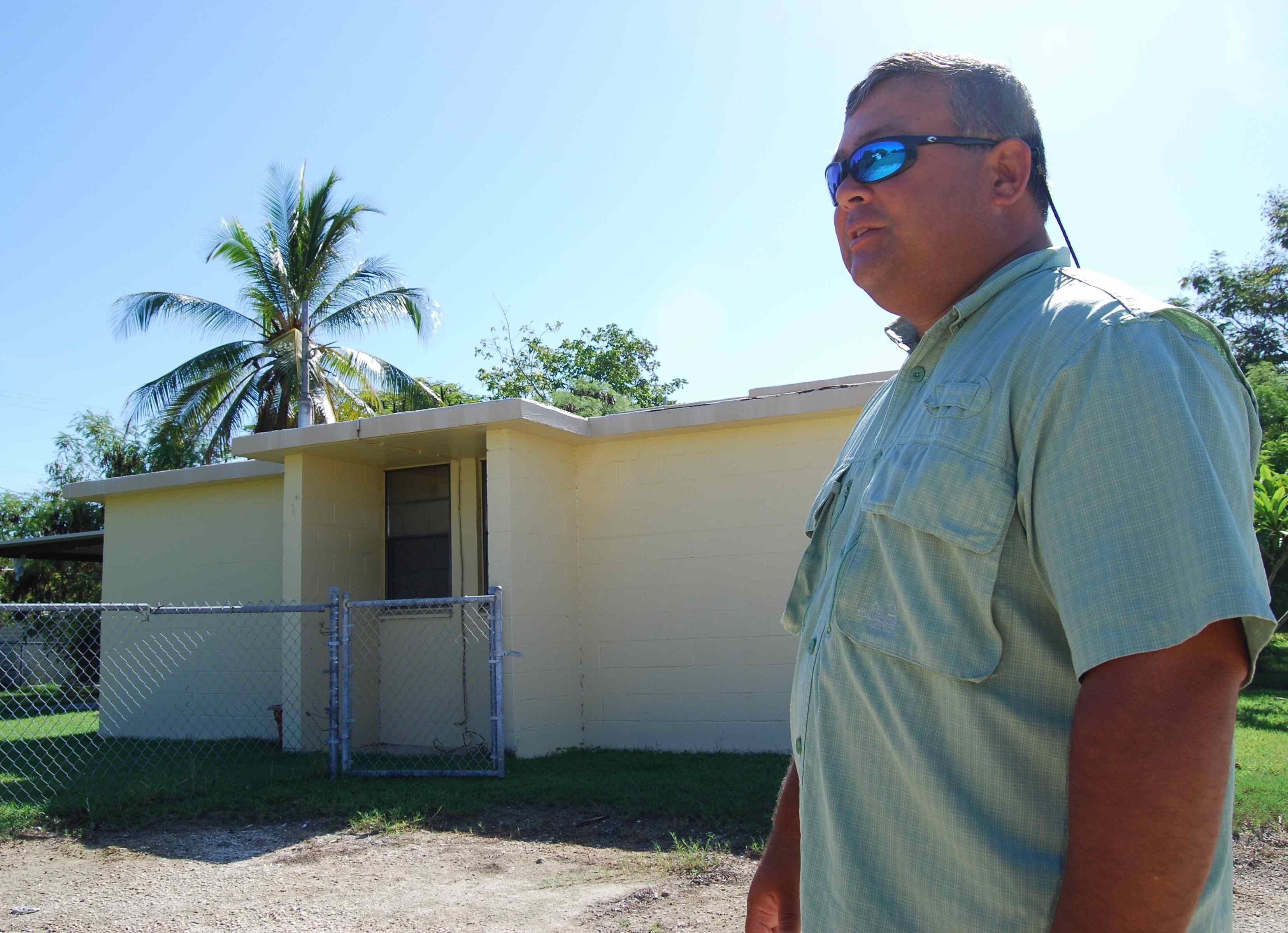 Base environmental director Mike McCord in front of his childhood home at Gitmo.