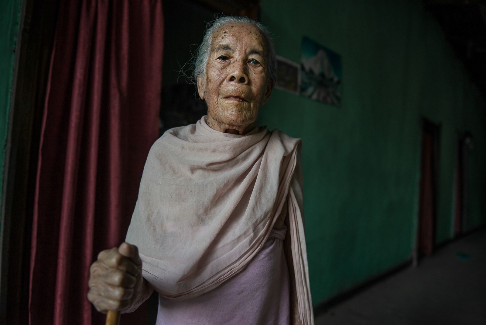 Sana Hanbi, a 92-year old resident of the village of Thanga Tongbram, poses for a portrait. Image by Neeta Satam. India, 2017.
